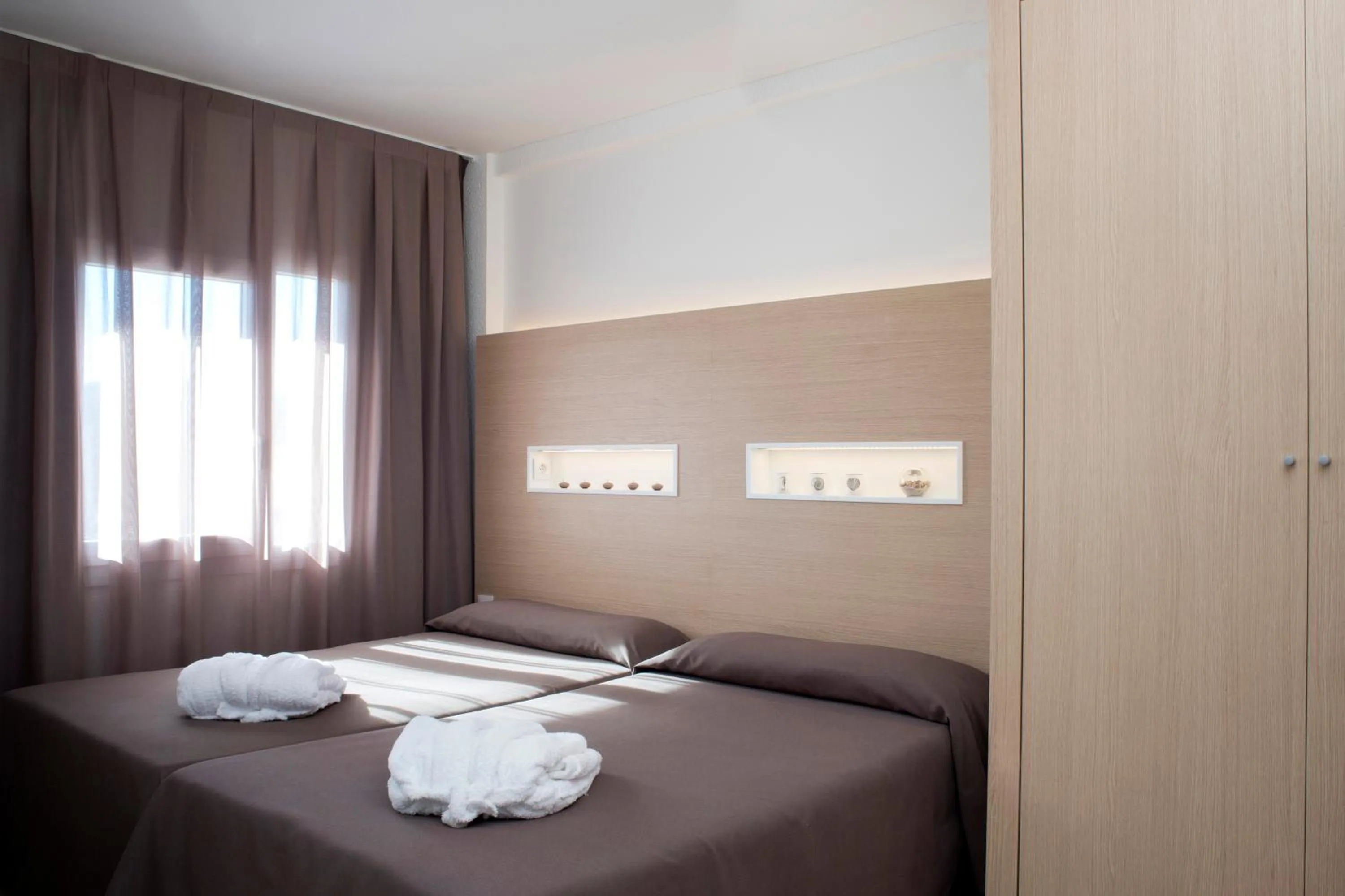 Bed in Aparthotel Acualandia