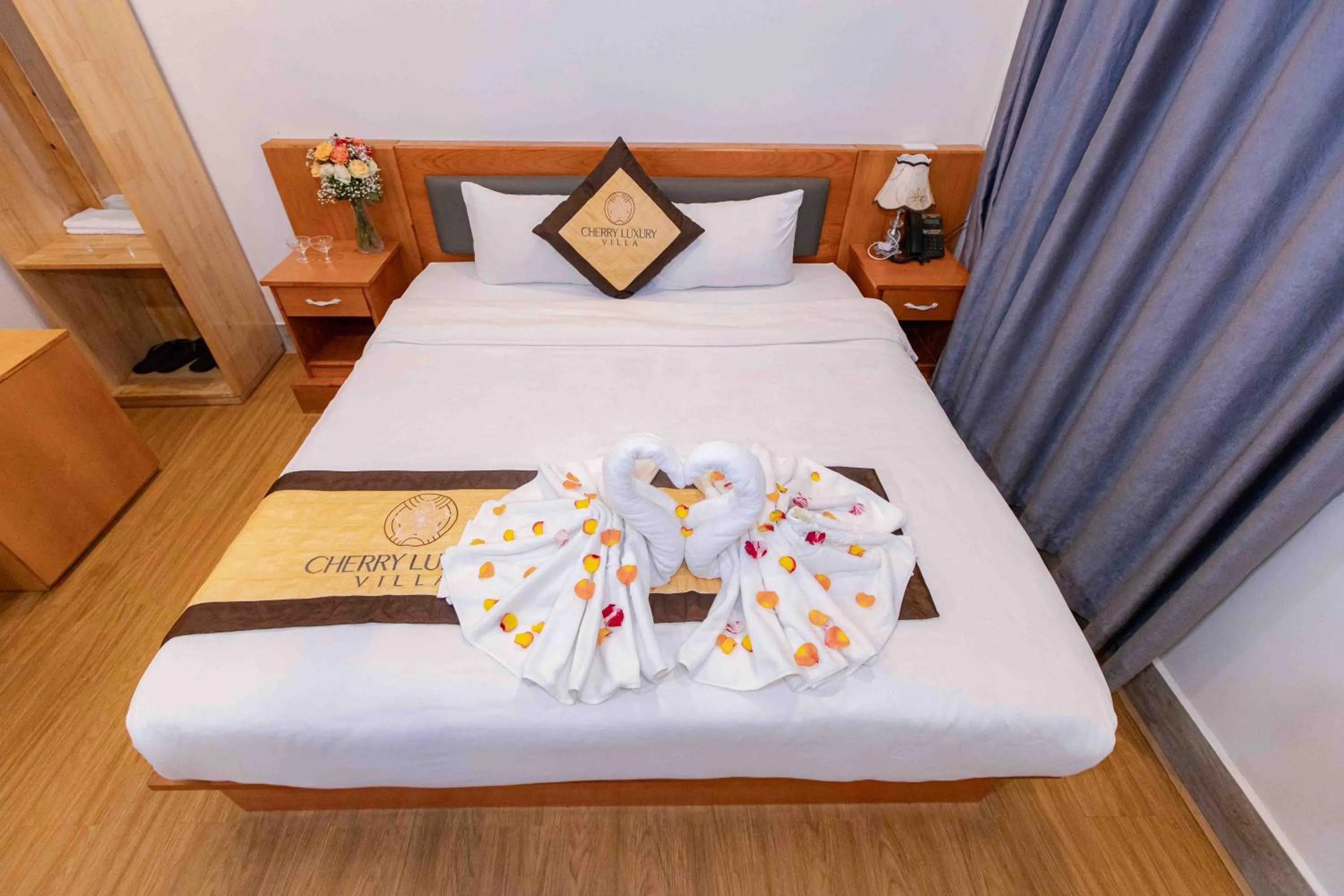 Bed in Cherry Luxury Hotel