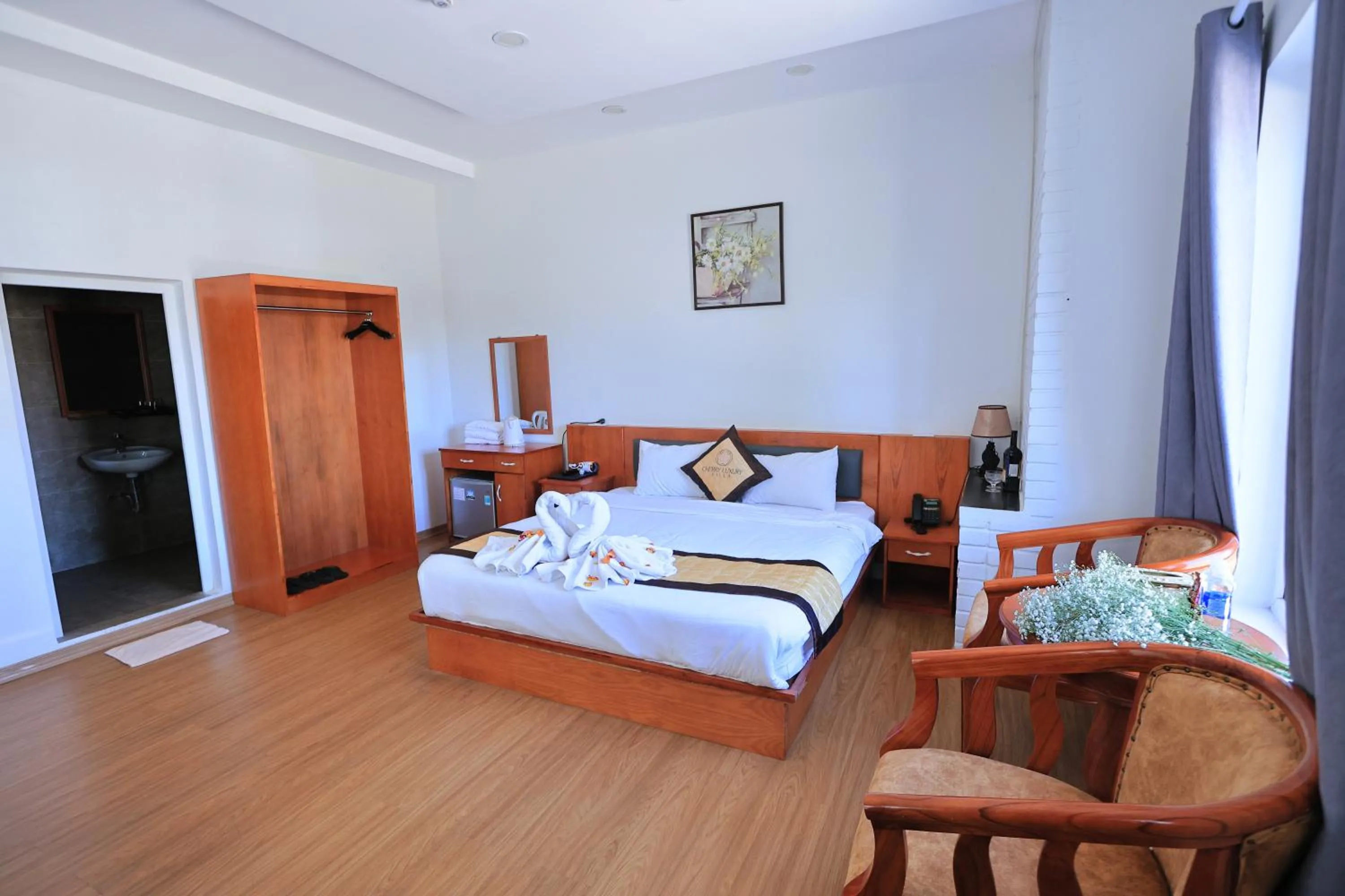 Bed in Cherry Luxury Hotel