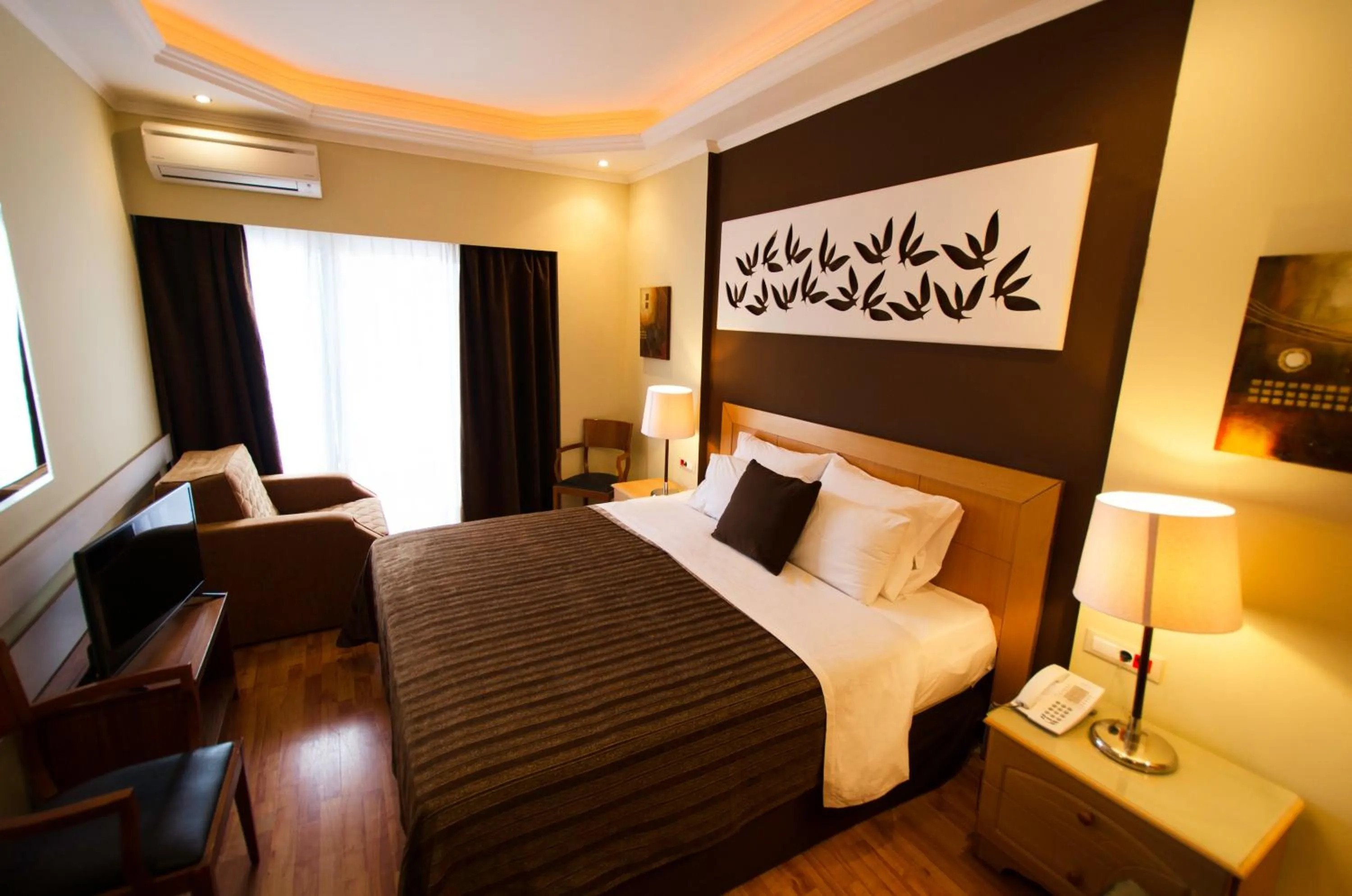 Bedroom in Lydia Hotel