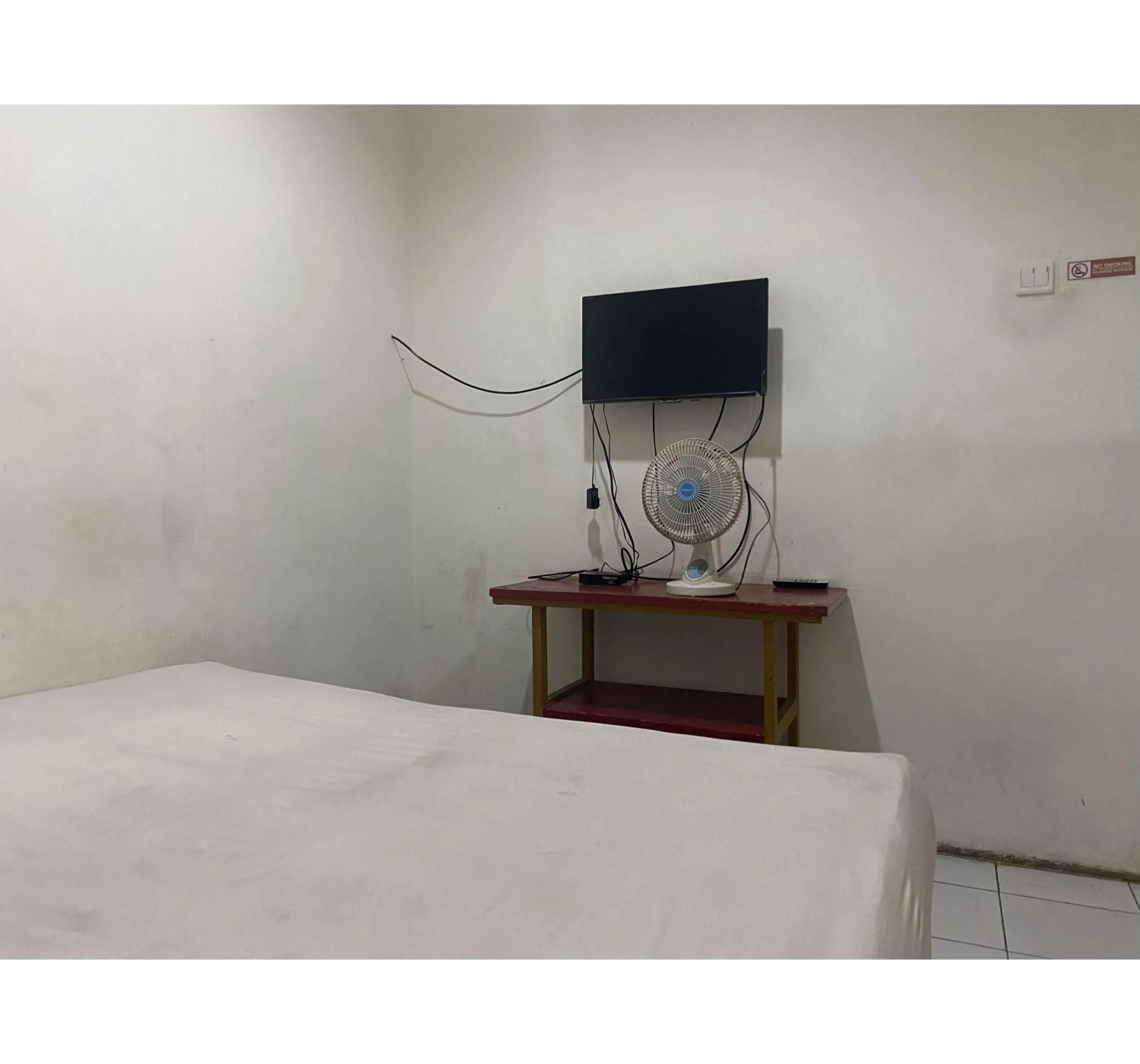 Bedroom, Bed in Hotel O Penginapan Fajar Syariah