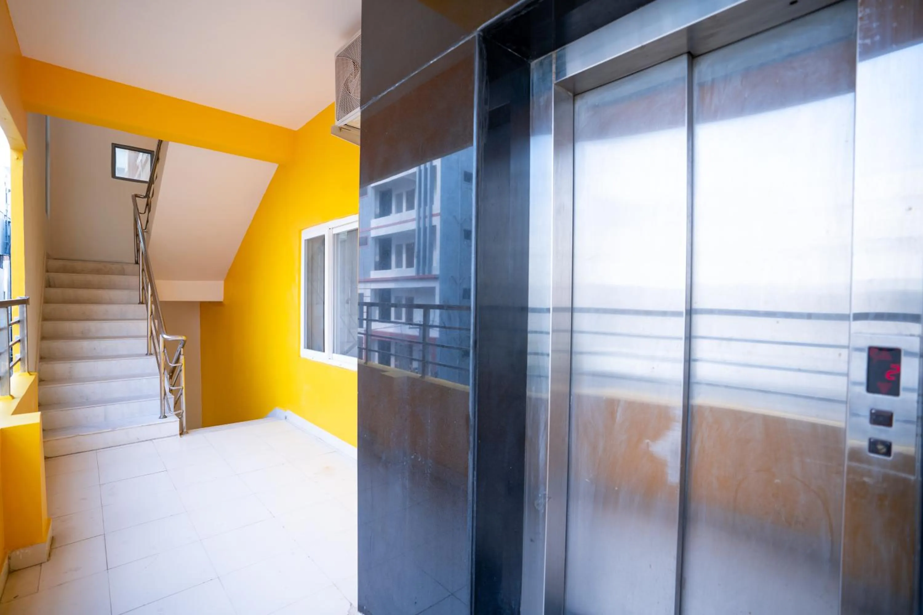 elevator in Yellow Bells Signature HITEC City