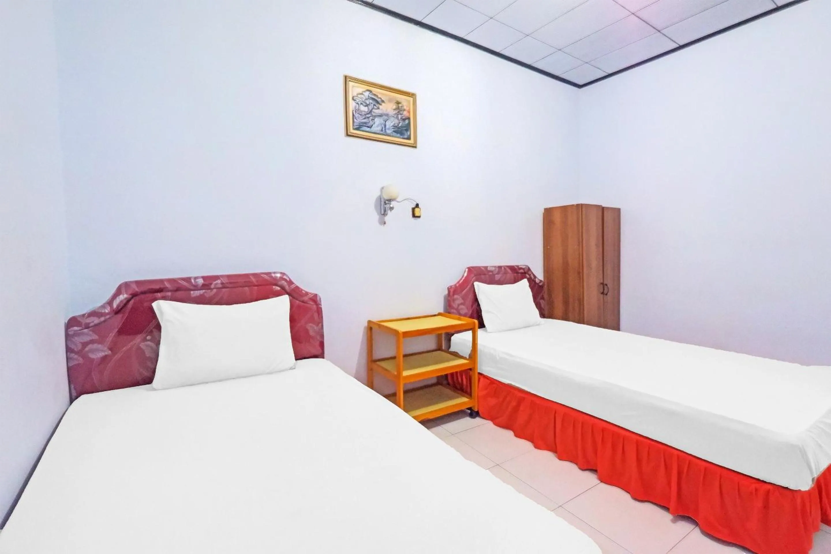 Bedroom, Bed in Hotel O Wisma Arwini Syariah Near Benteng Balangnipa