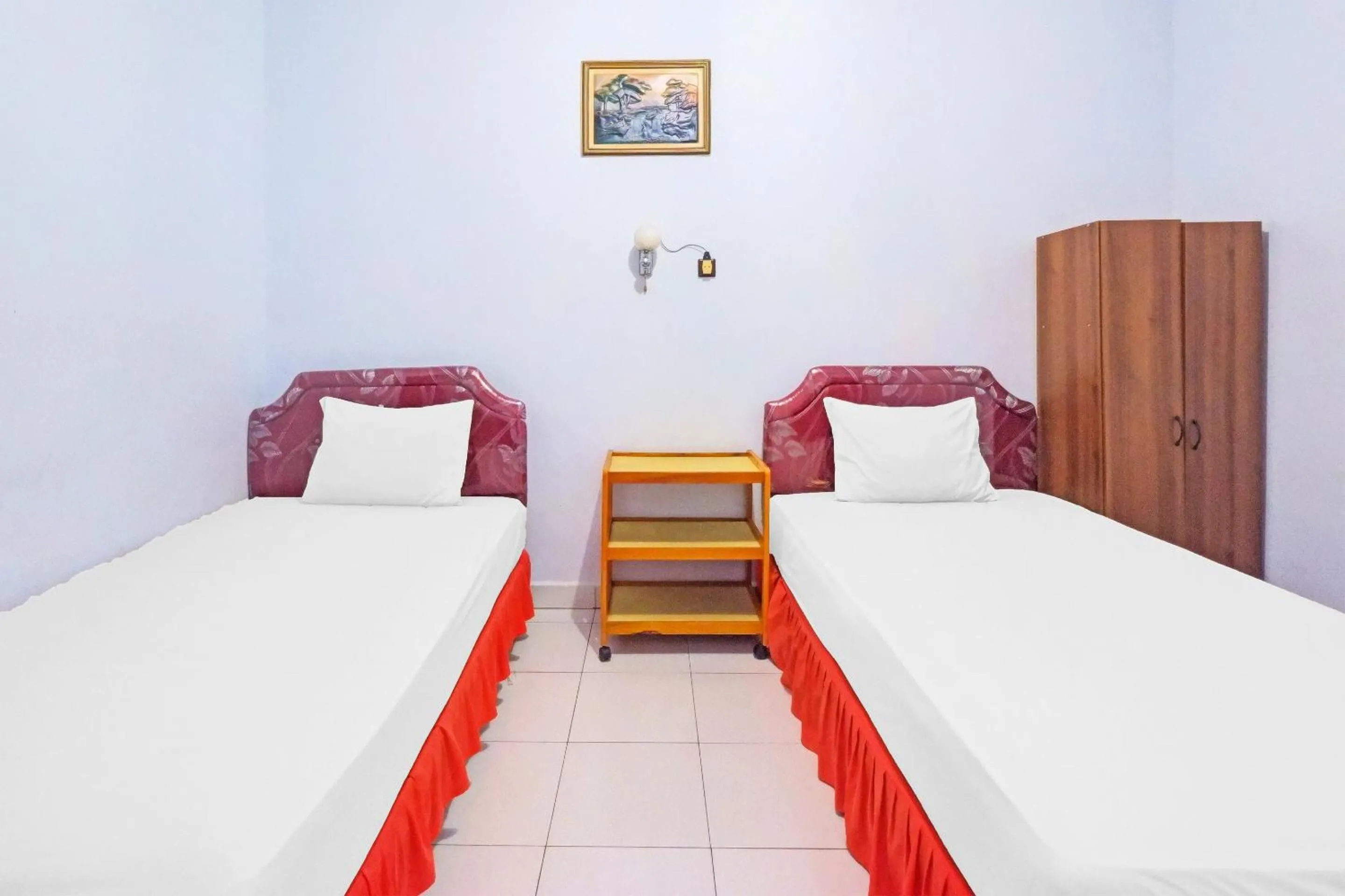 Bedroom, Bed in Hotel O Wisma Arwini Syariah Near Benteng Balangnipa
