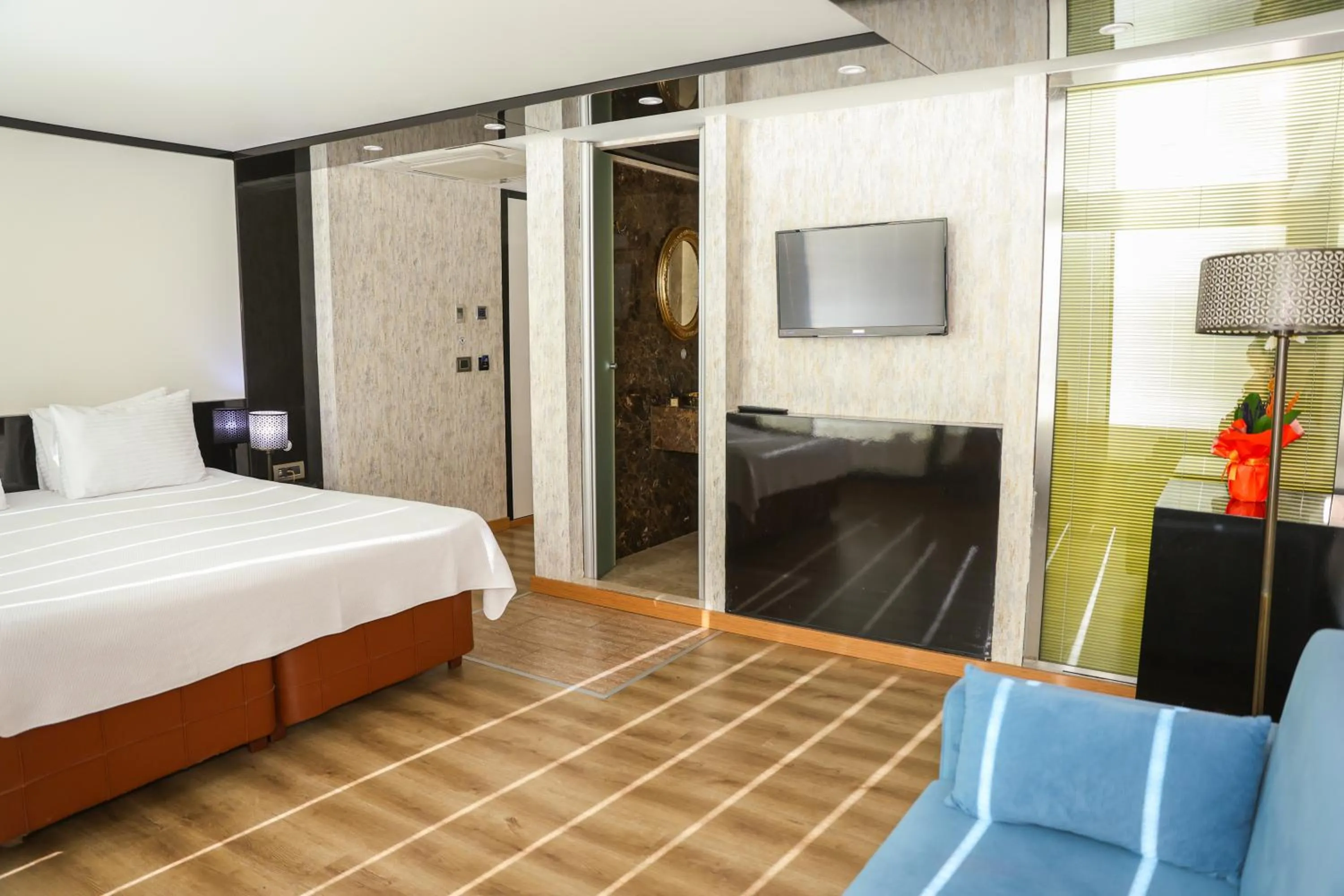 Bed in The Hera Platinum Hotel