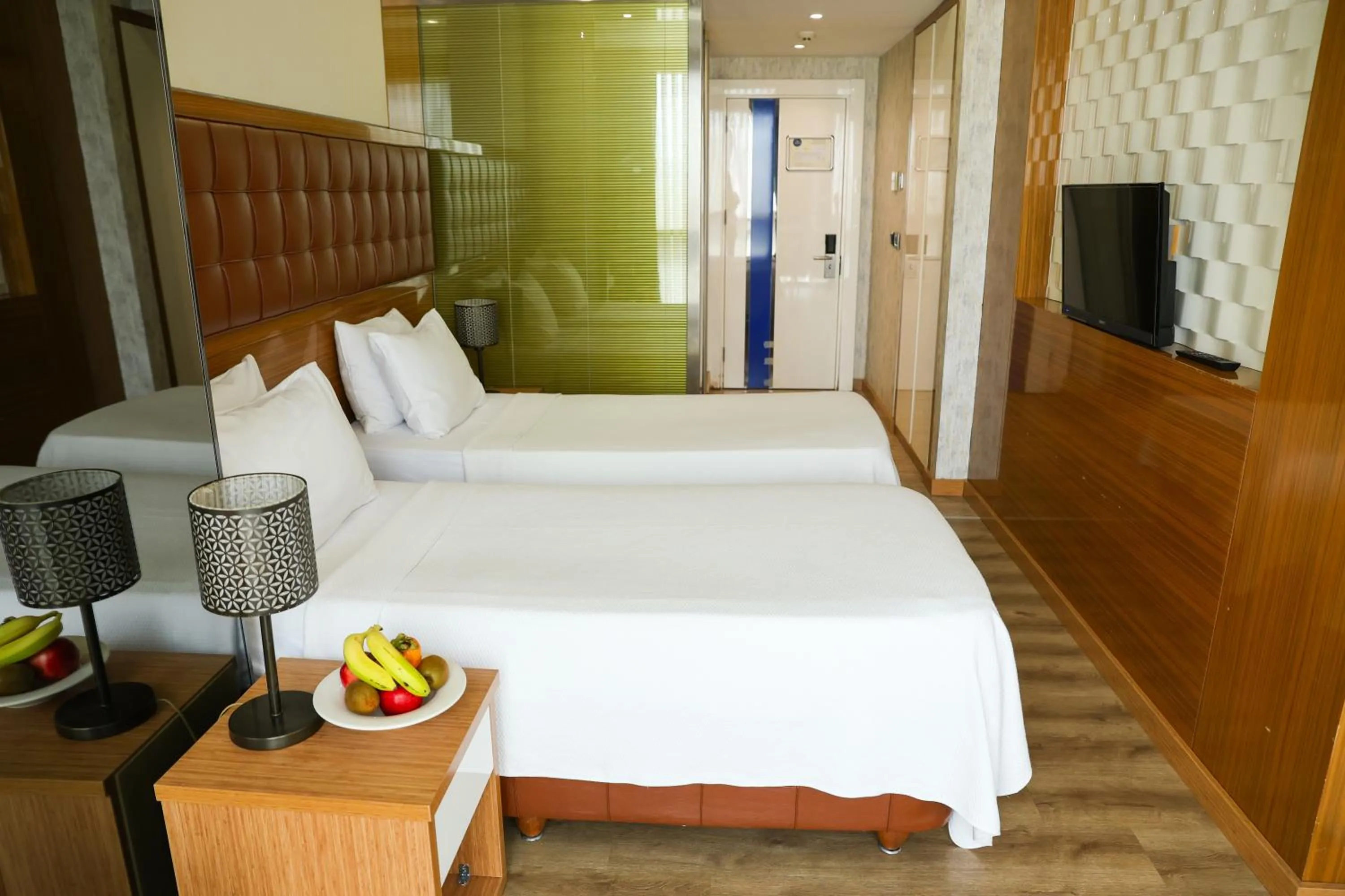 Bed in The Hera Platinum Hotel