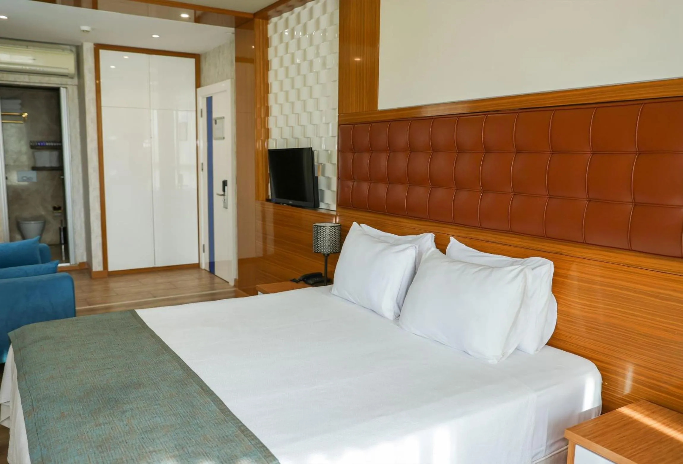 Bed in The Hera Platinum Hotel