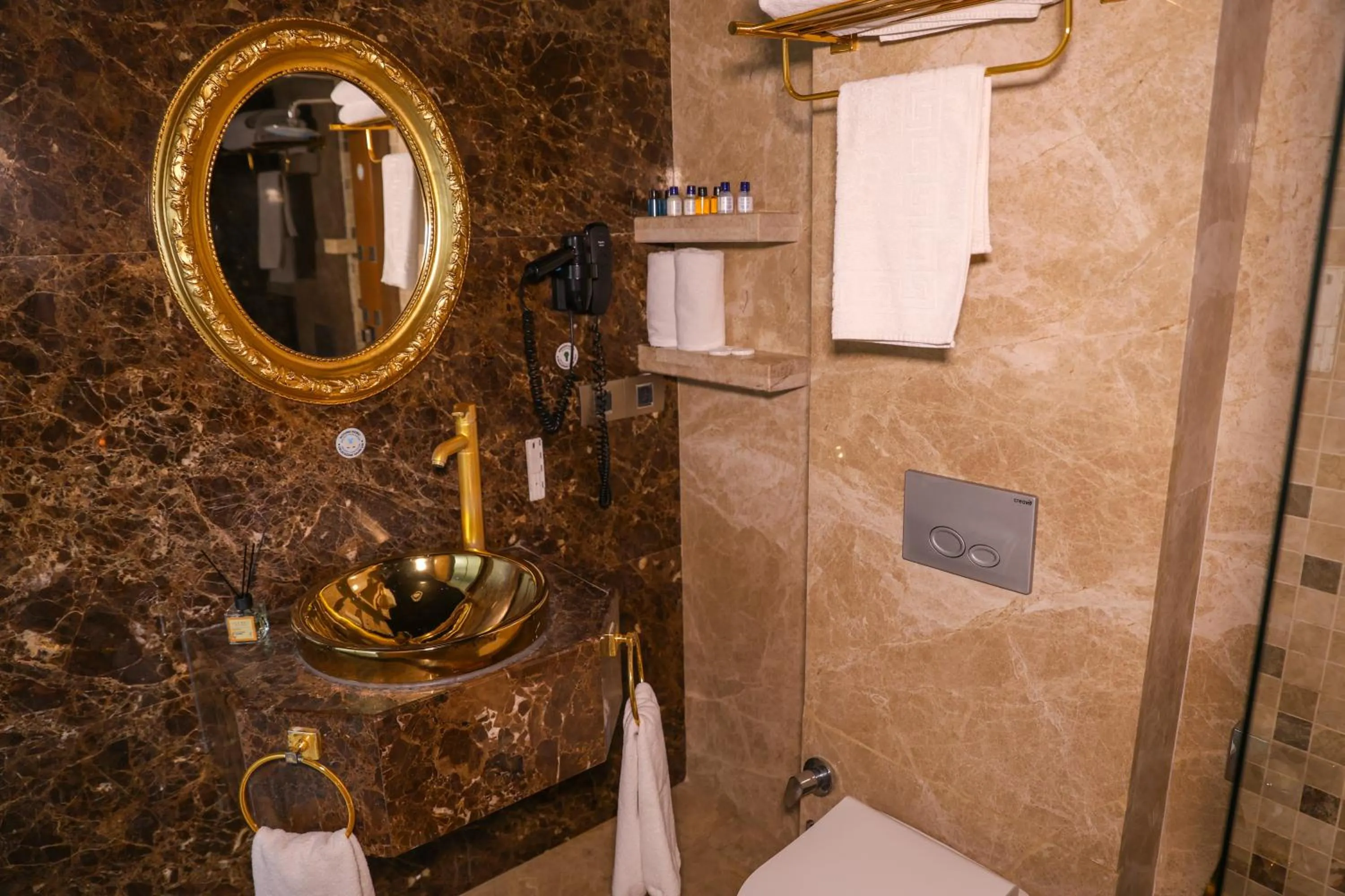 Bathroom in The Hera Platinum Hotel