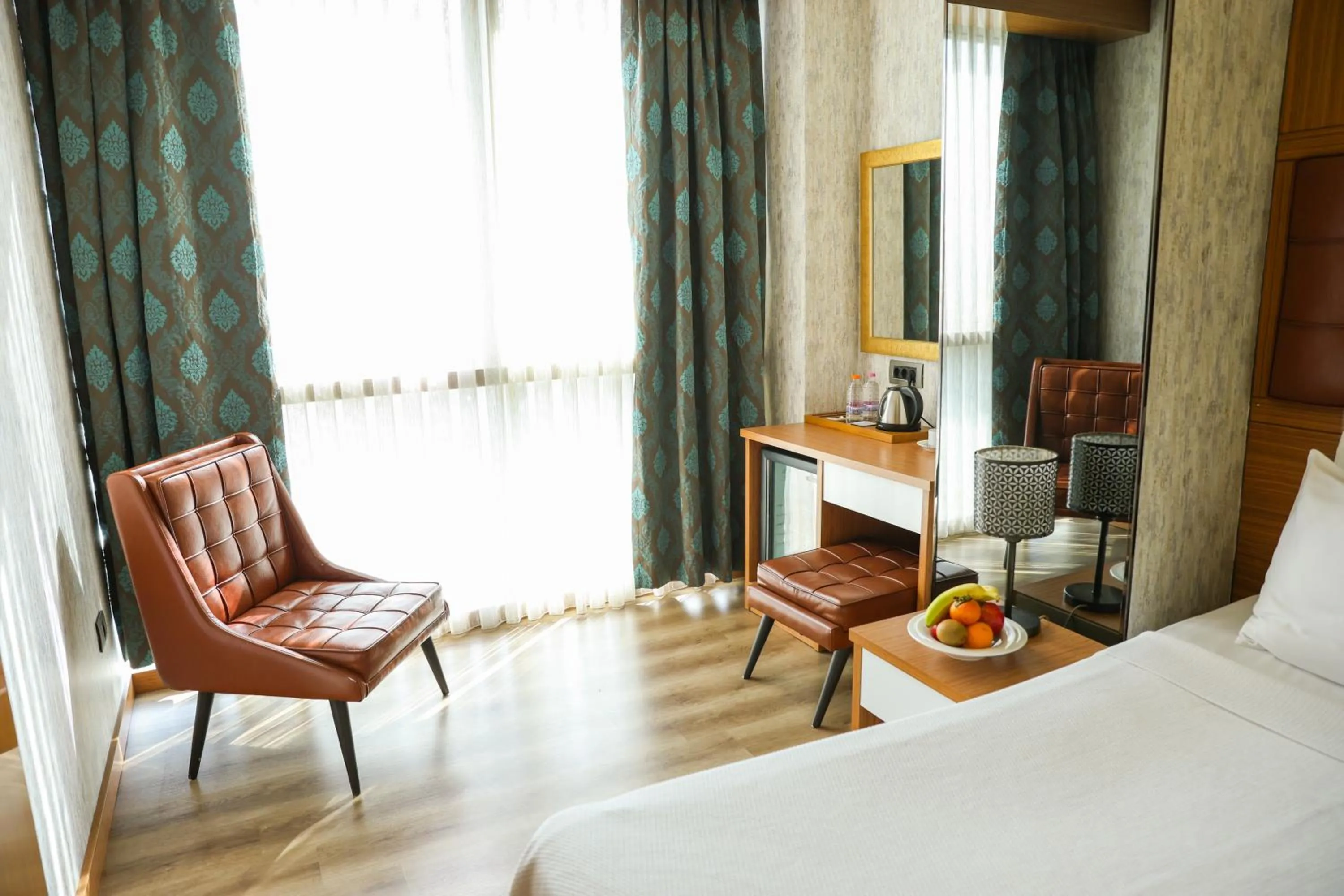 Bed in The Hera Platinum Hotel