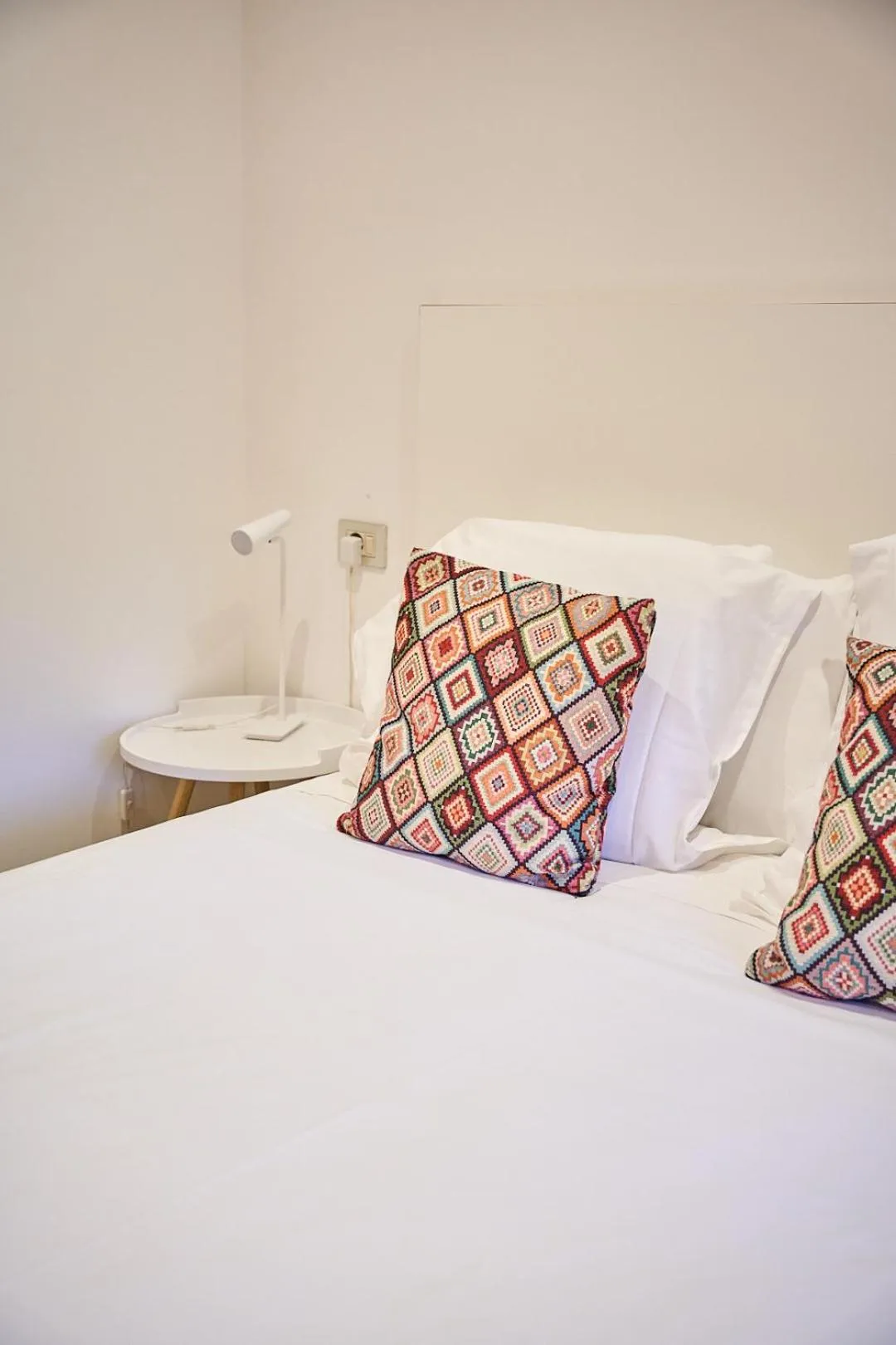 Bed in NM Suites by Escampa Hotels