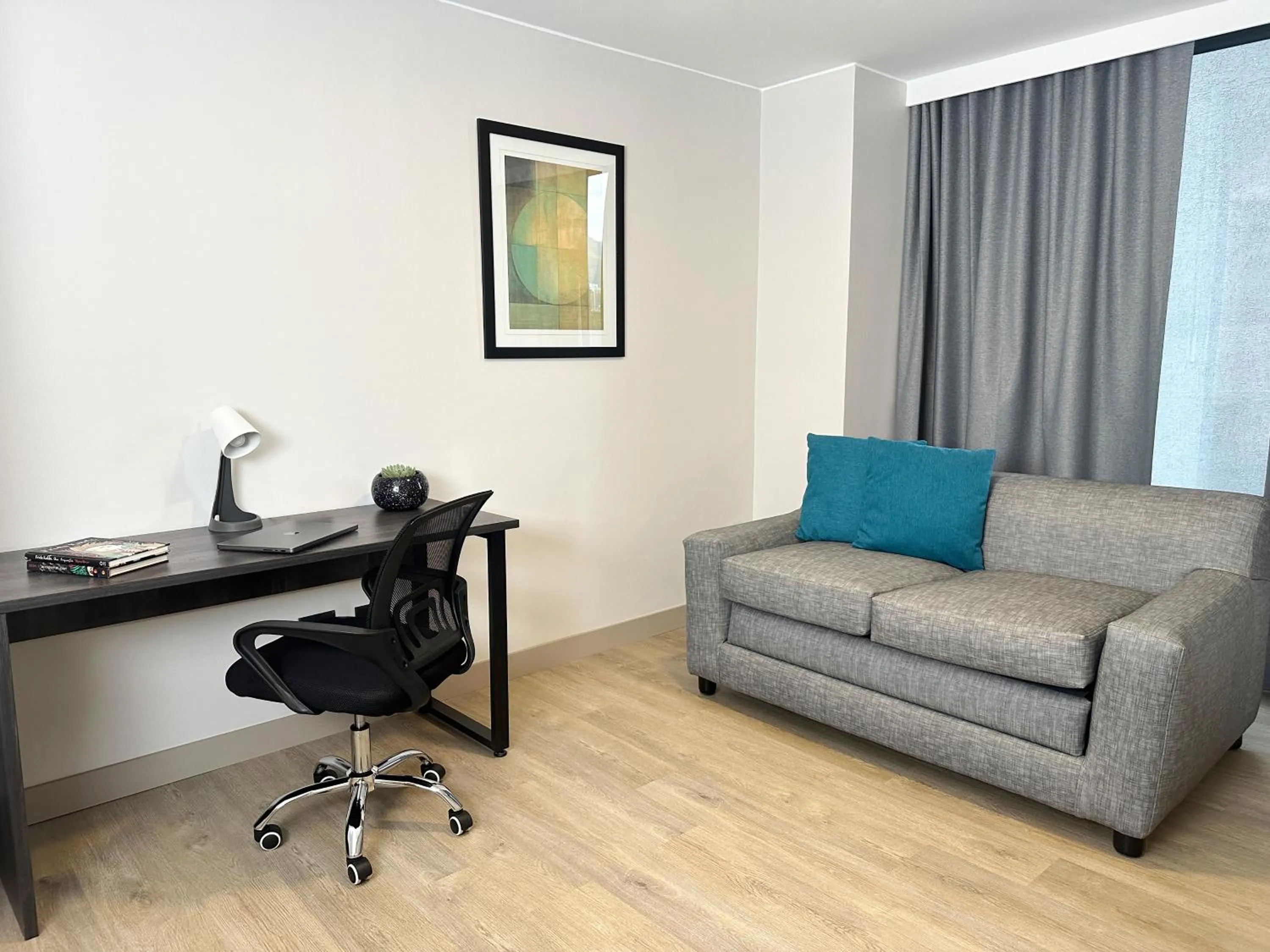 Living room in La Quinta by Wyndham Quito