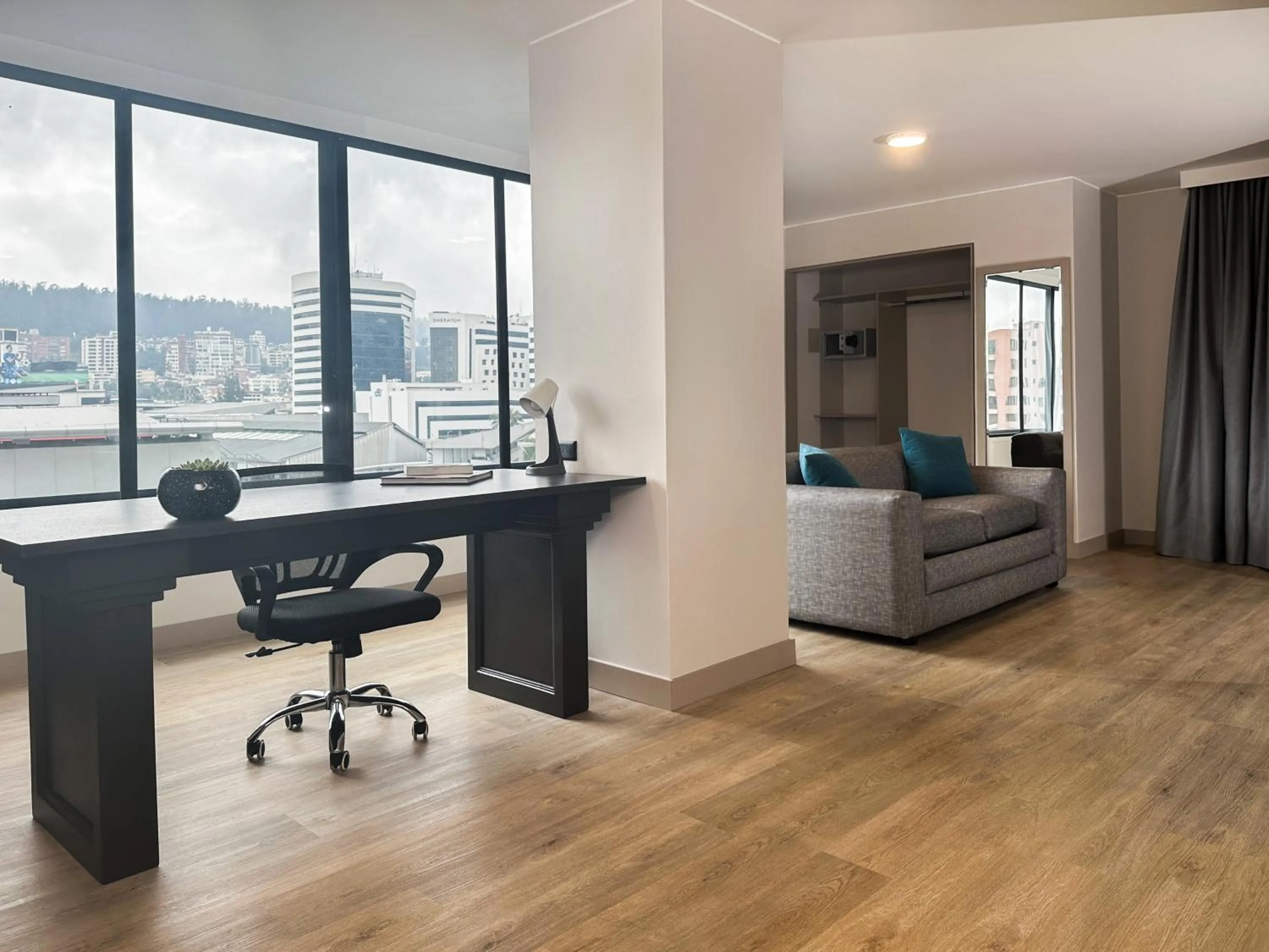 Living room in La Quinta by Wyndham Quito