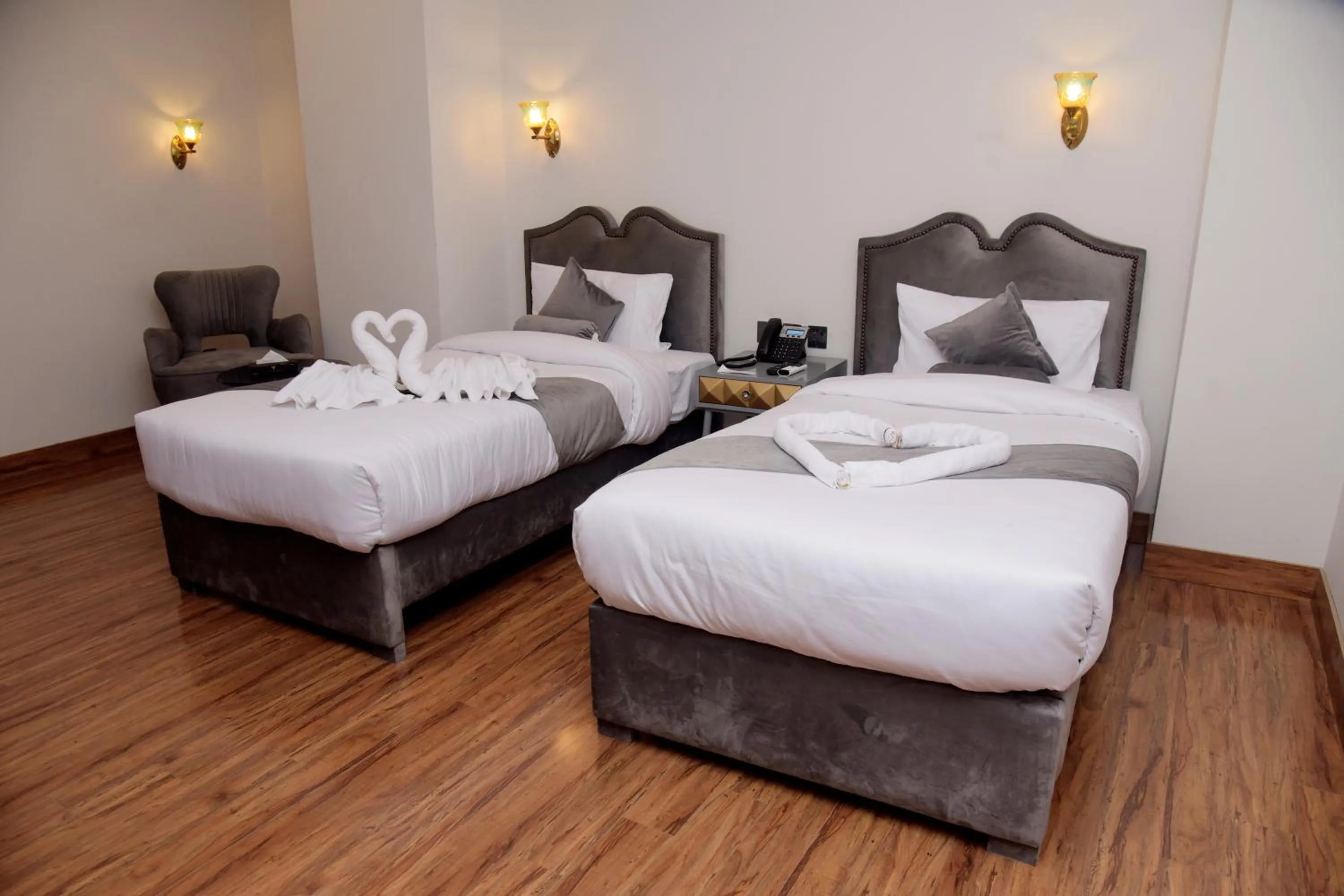 Bedroom, Bed in The Rich Hotel & Apartments