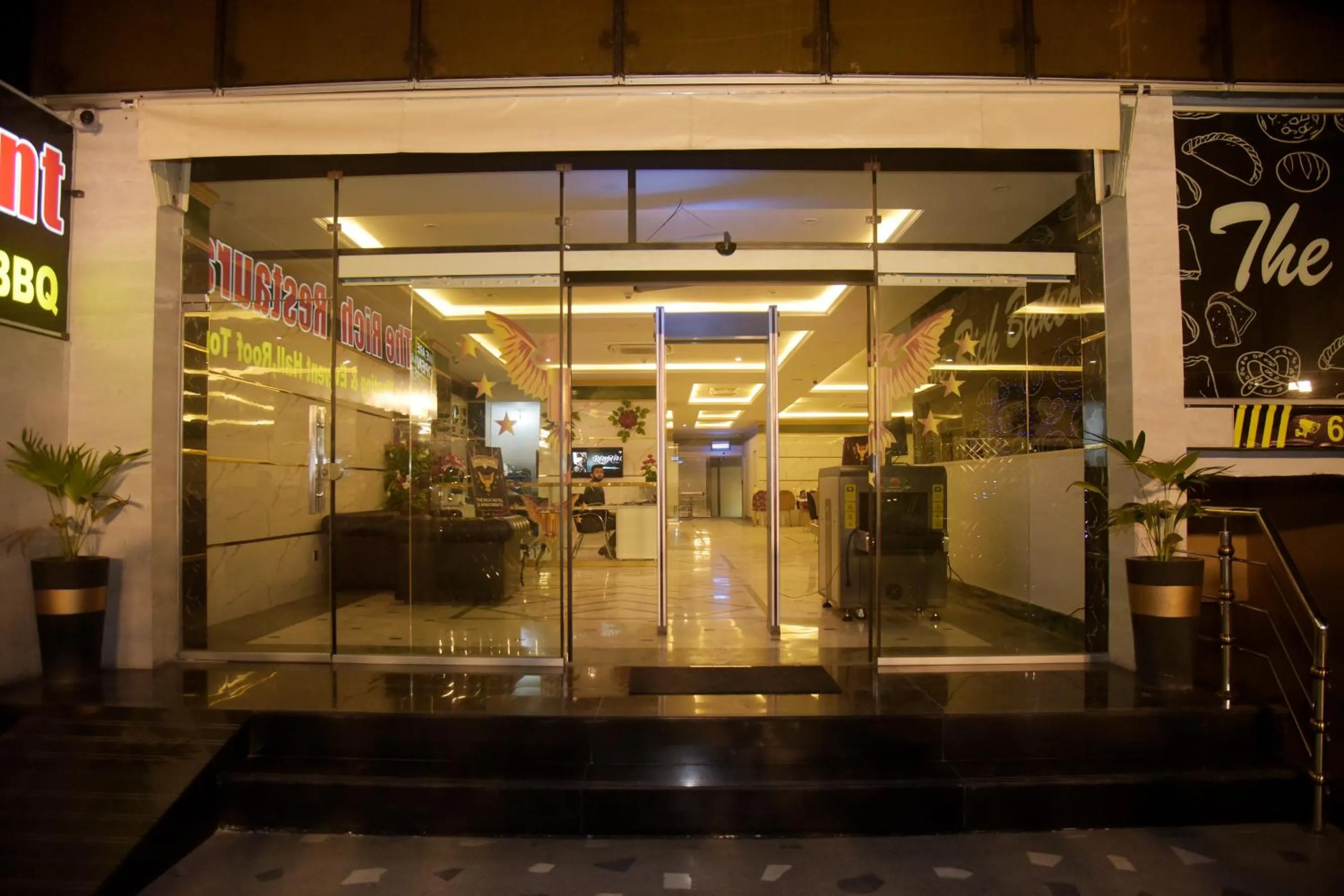 Property building in The Rich Hotel & Apartments