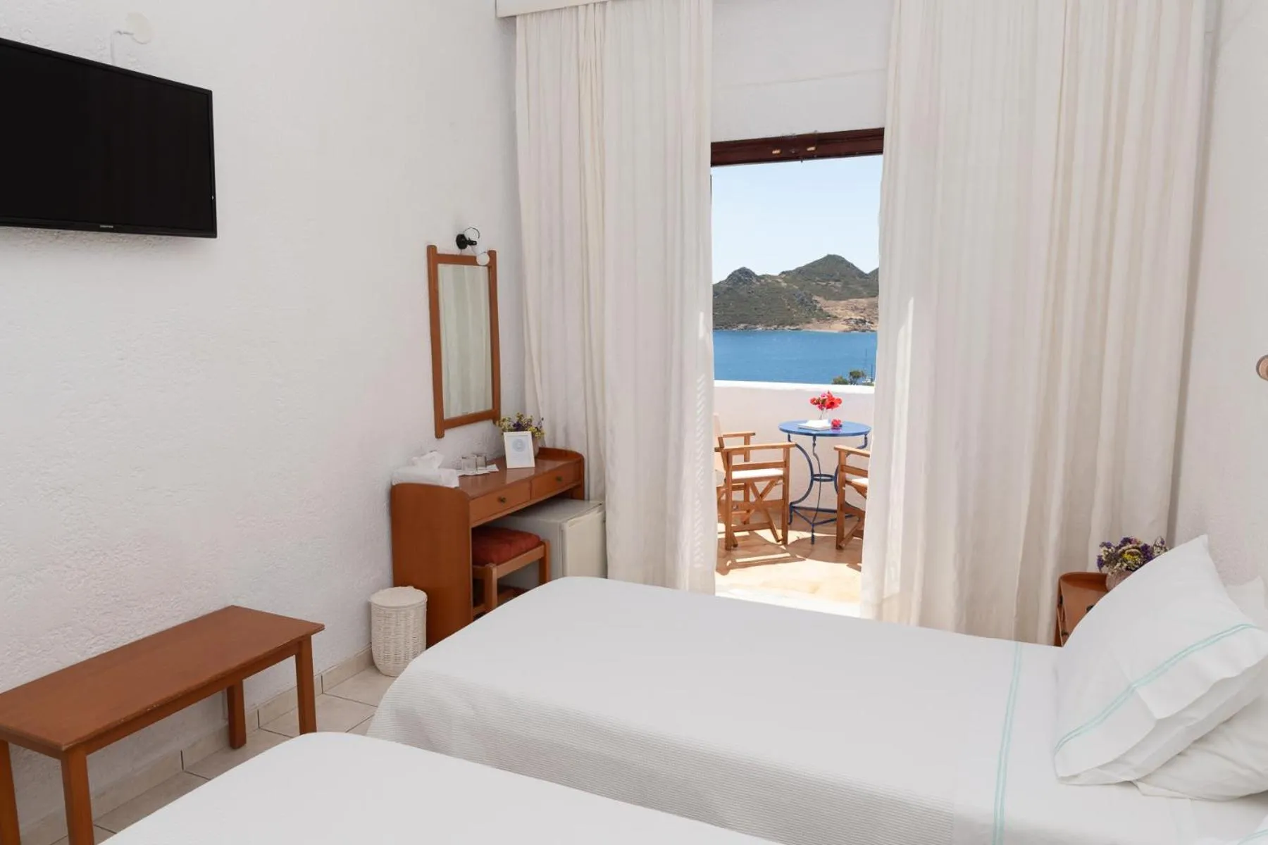 Bed in Golden Sun Hotel Patmos