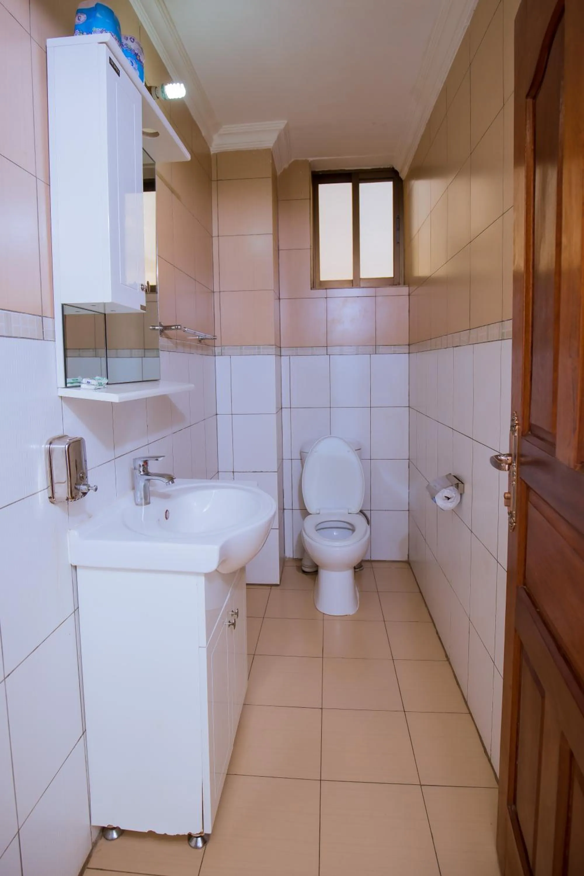 Toilet in KAMI LUXURY APARTMENTS