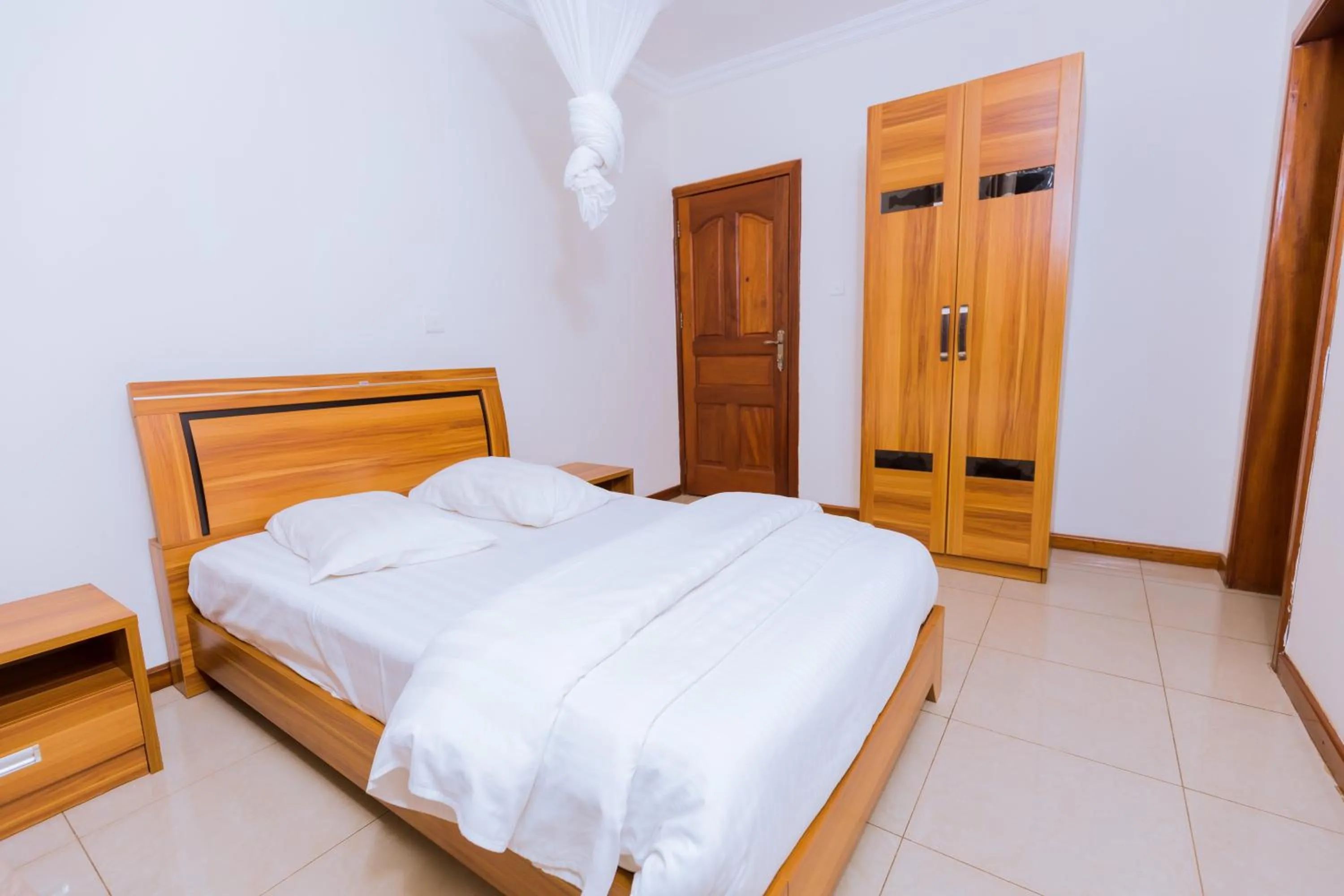 Bedroom, Bed in KAMI LUXURY APARTMENTS