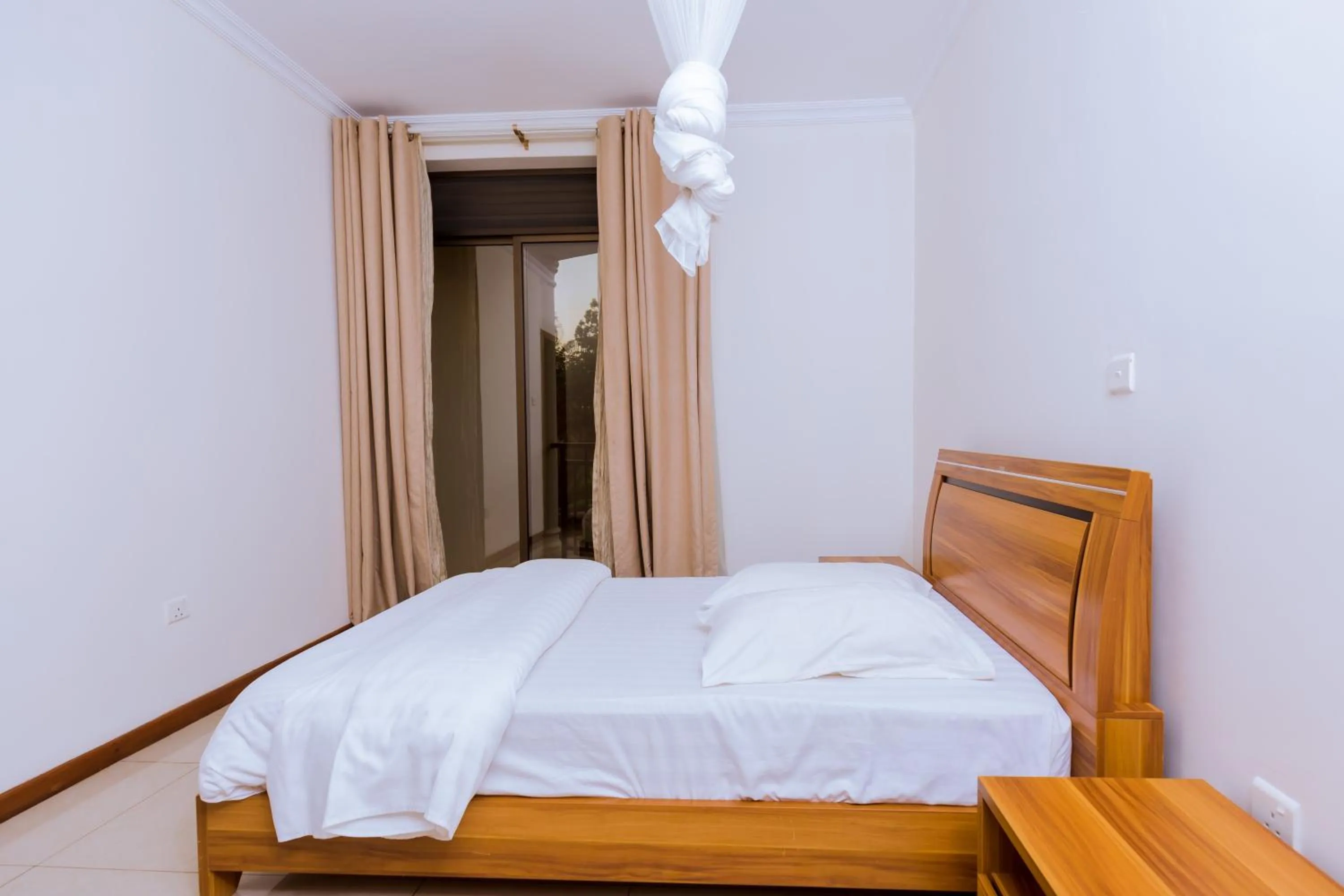 Bedroom, Bed in KAMI LUXURY APARTMENTS