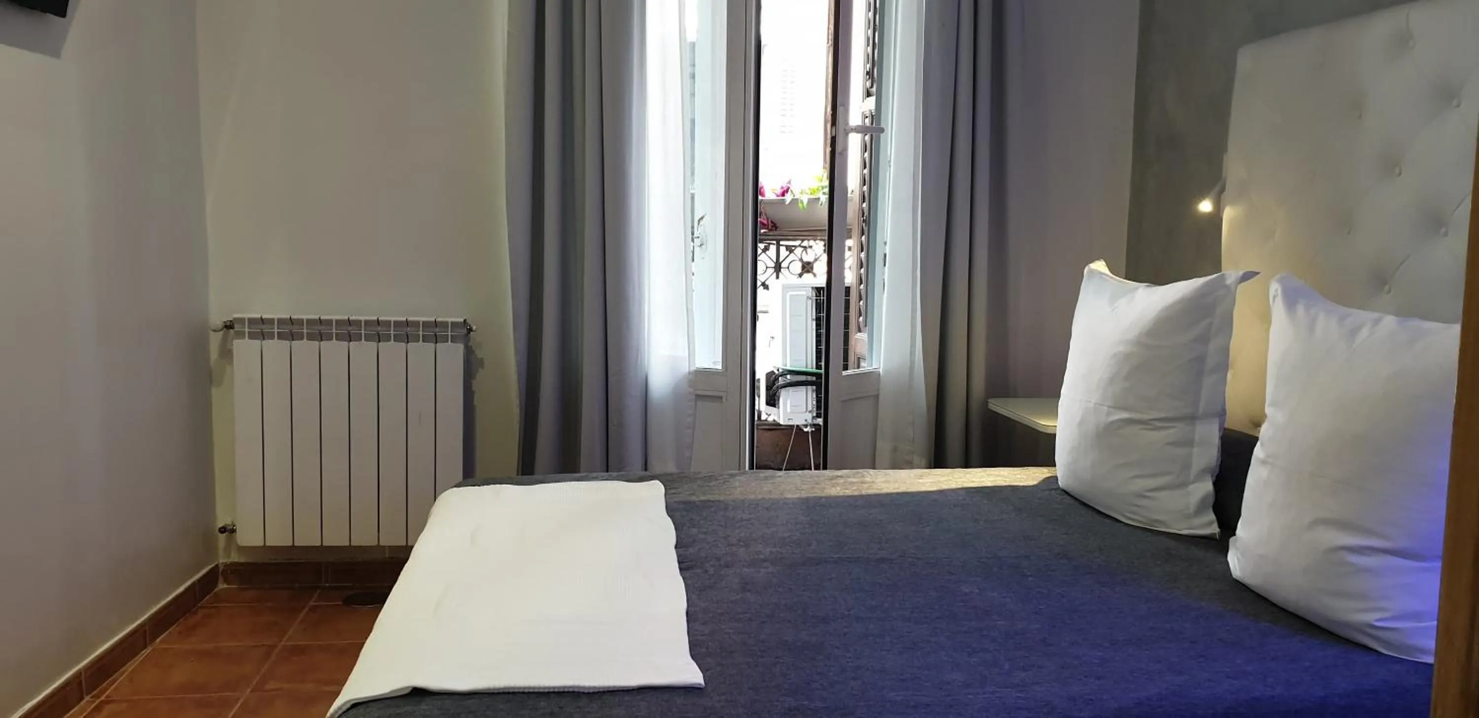 Photo of the whole room, Bed in Hostal Las Fuentes