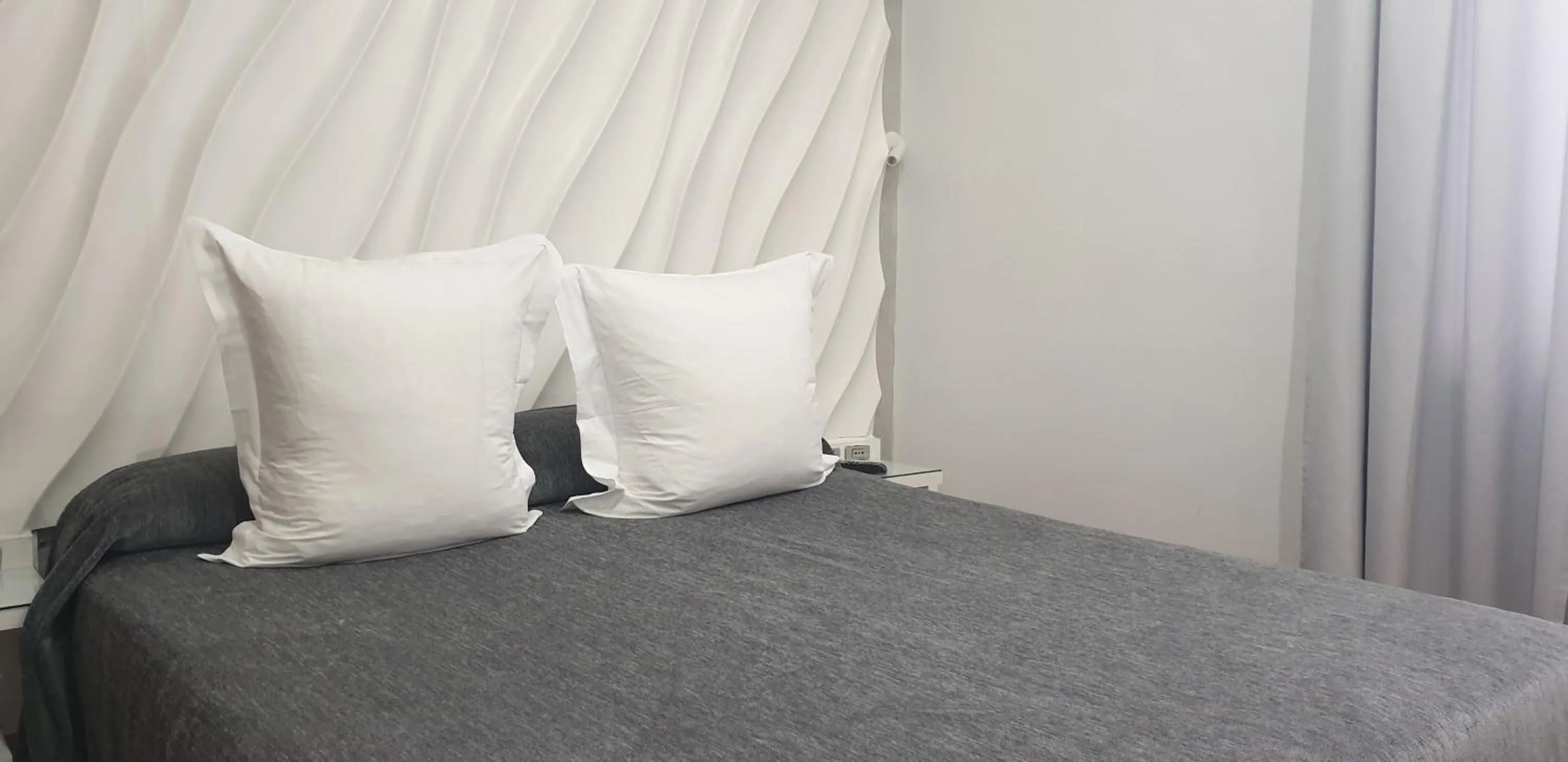 Bed in Hostal Las Fuentes