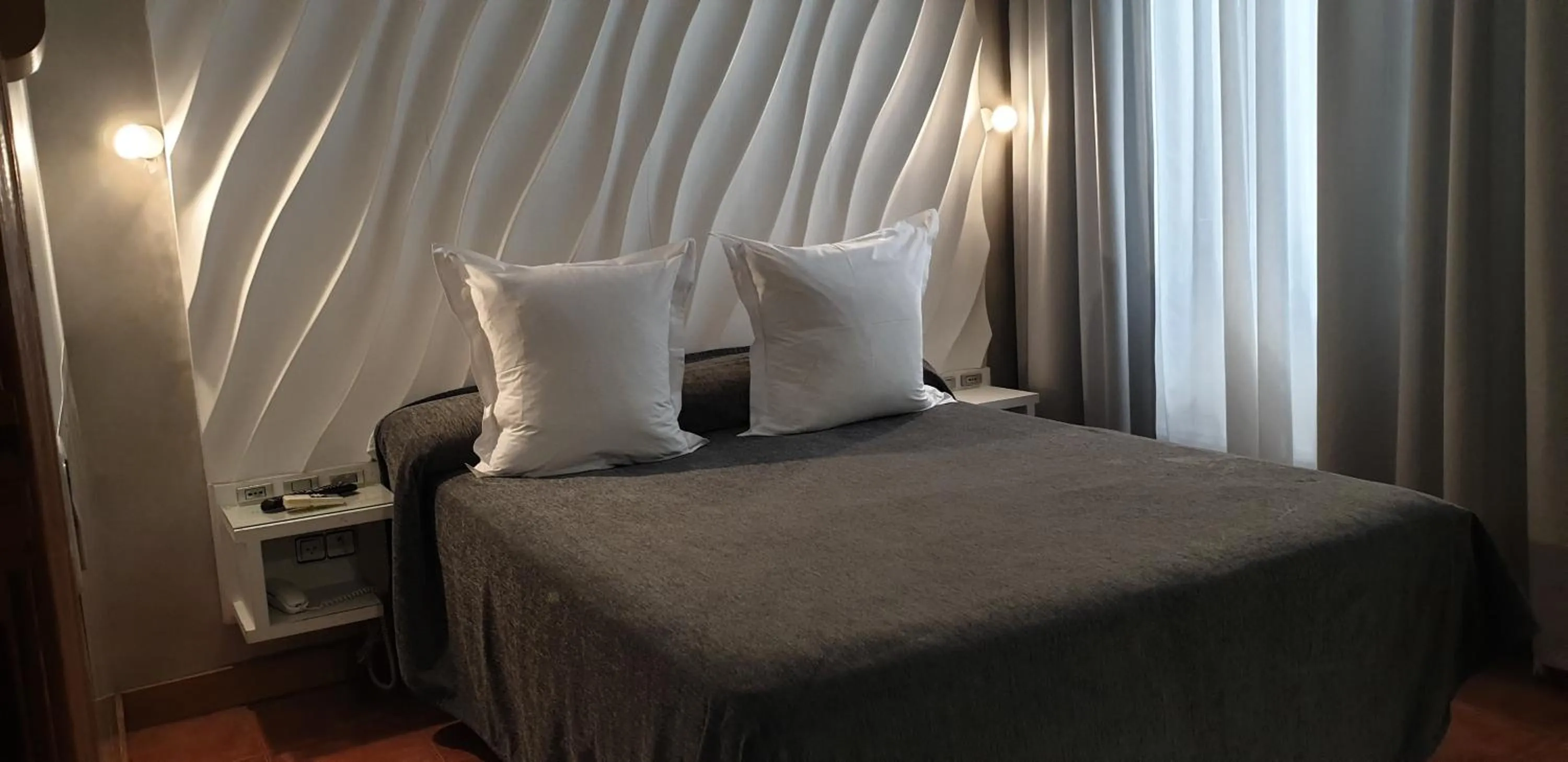 Bed in Hostal Las Fuentes