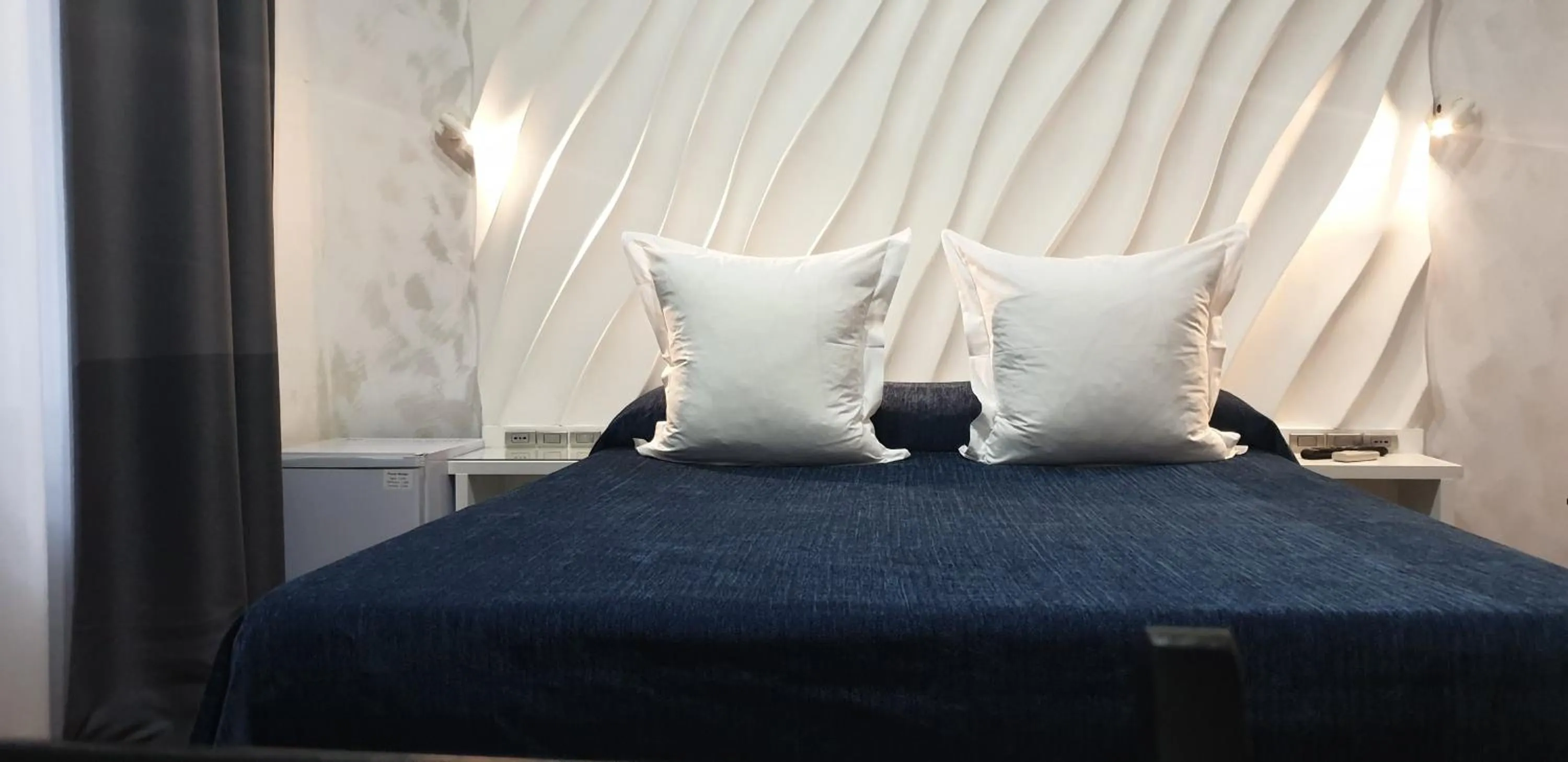 Bed in Hostal Las Fuentes