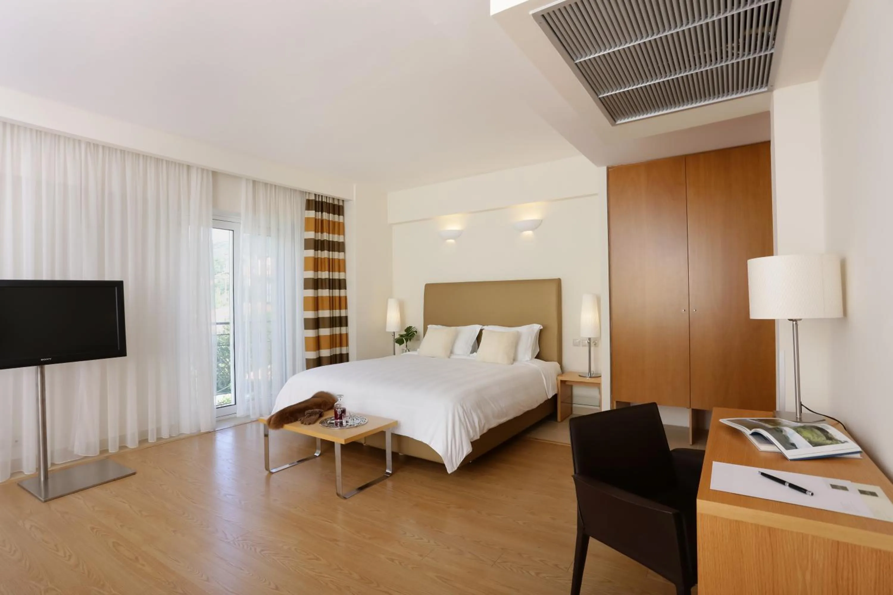 Photo of the whole room, Bed in Chloe Luxury Hotel