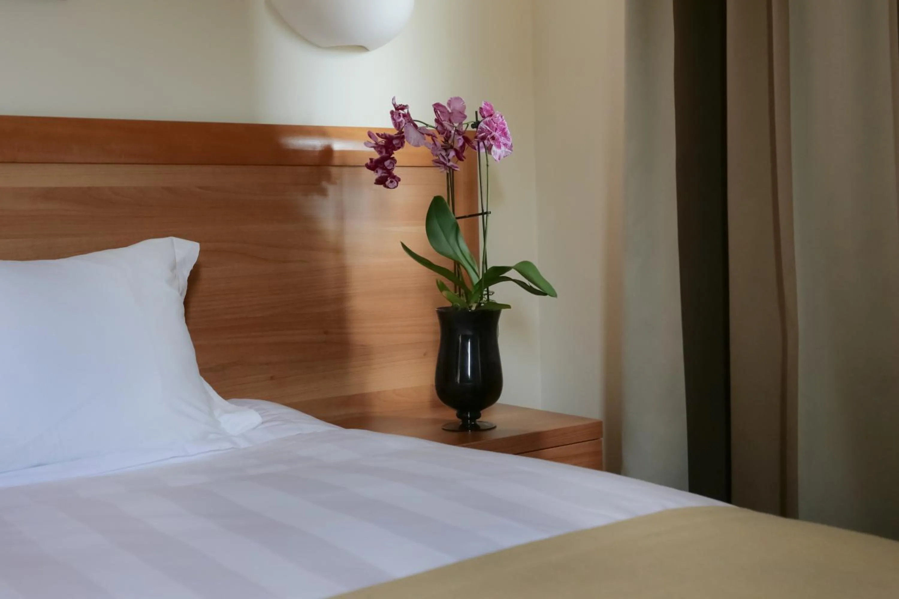 Decorative detail, Bed in Chloe Luxury Hotel