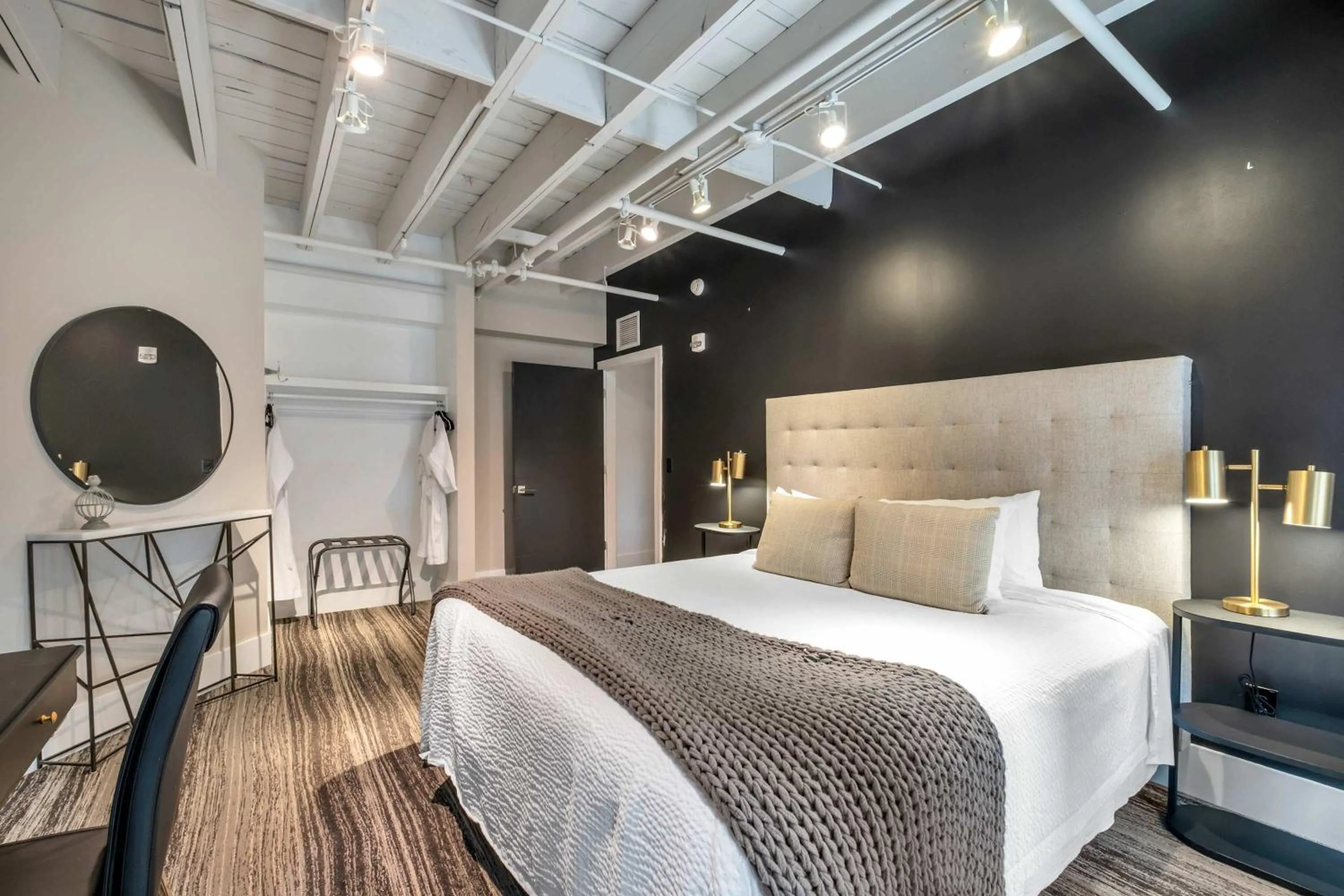 Bed in Skyline Suite with Penthouse & Rooftop Deck 6BR by Maddox Hotel