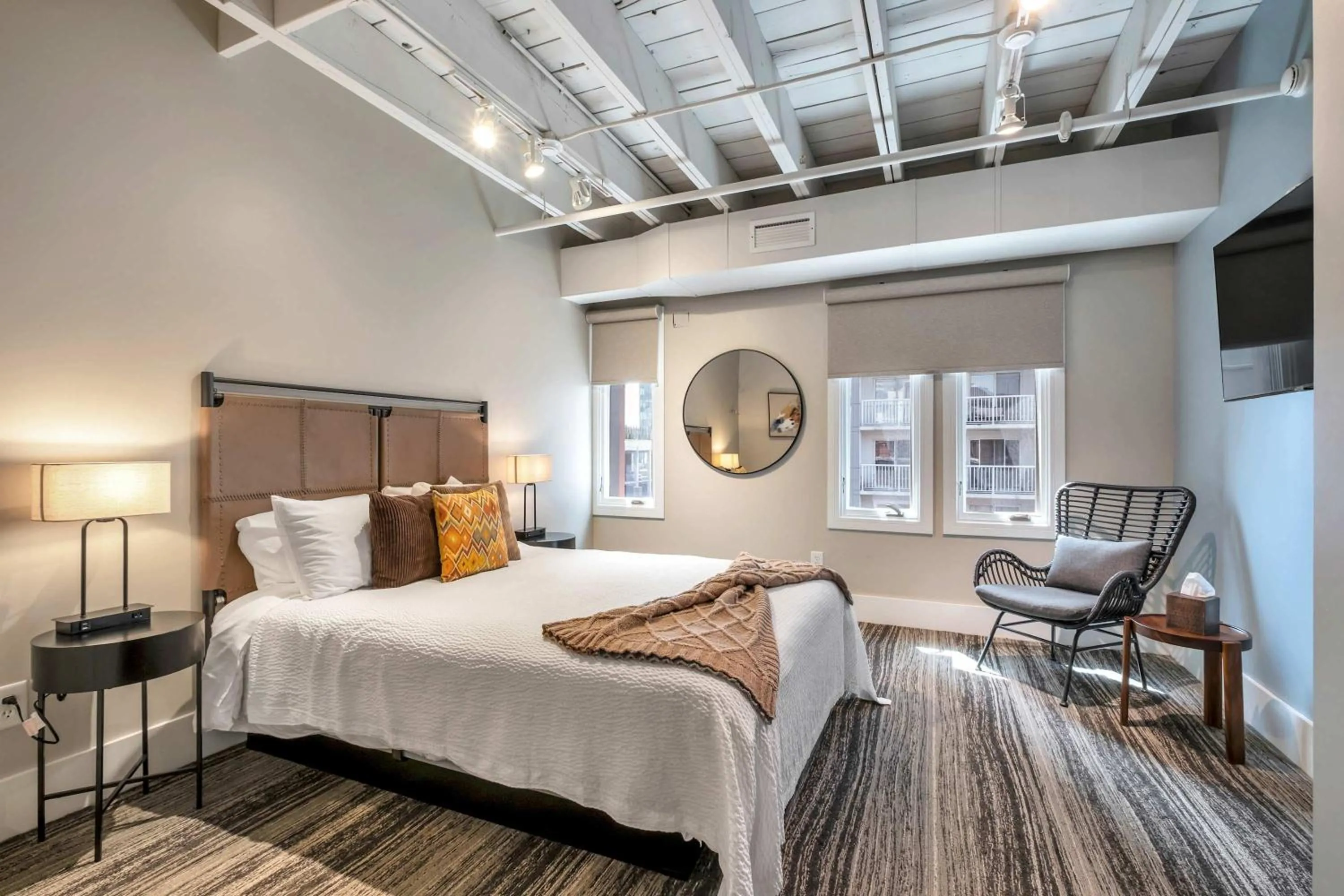 Bed in Skyline Suite with Penthouse & Rooftop Deck 6BR by Maddox Hotel