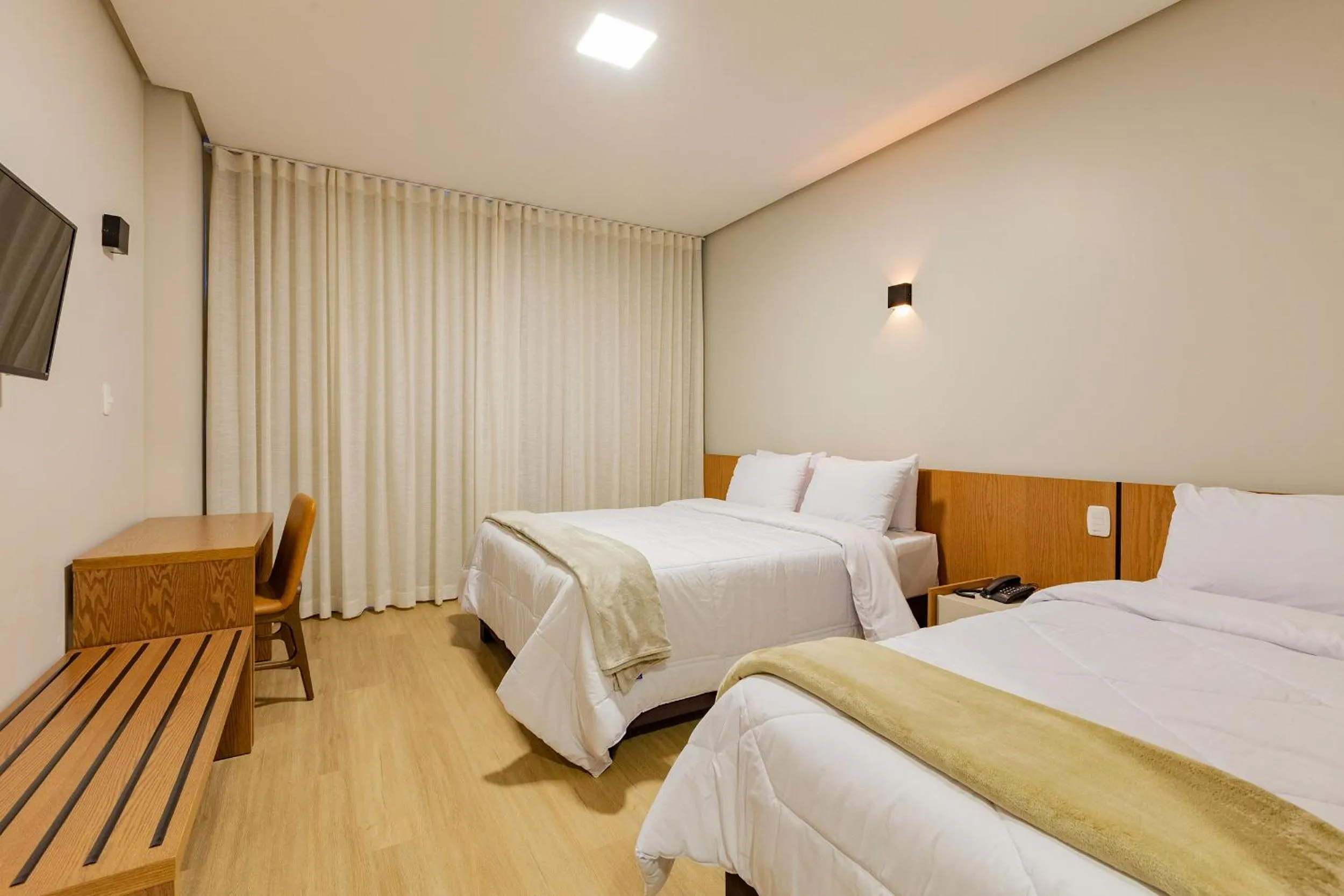 Bed in Tri Hotel Antônio Prado