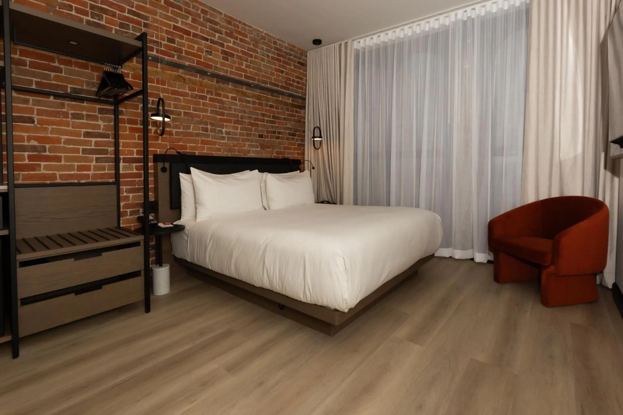 Bed in Le Petit Hotel Notre Dame