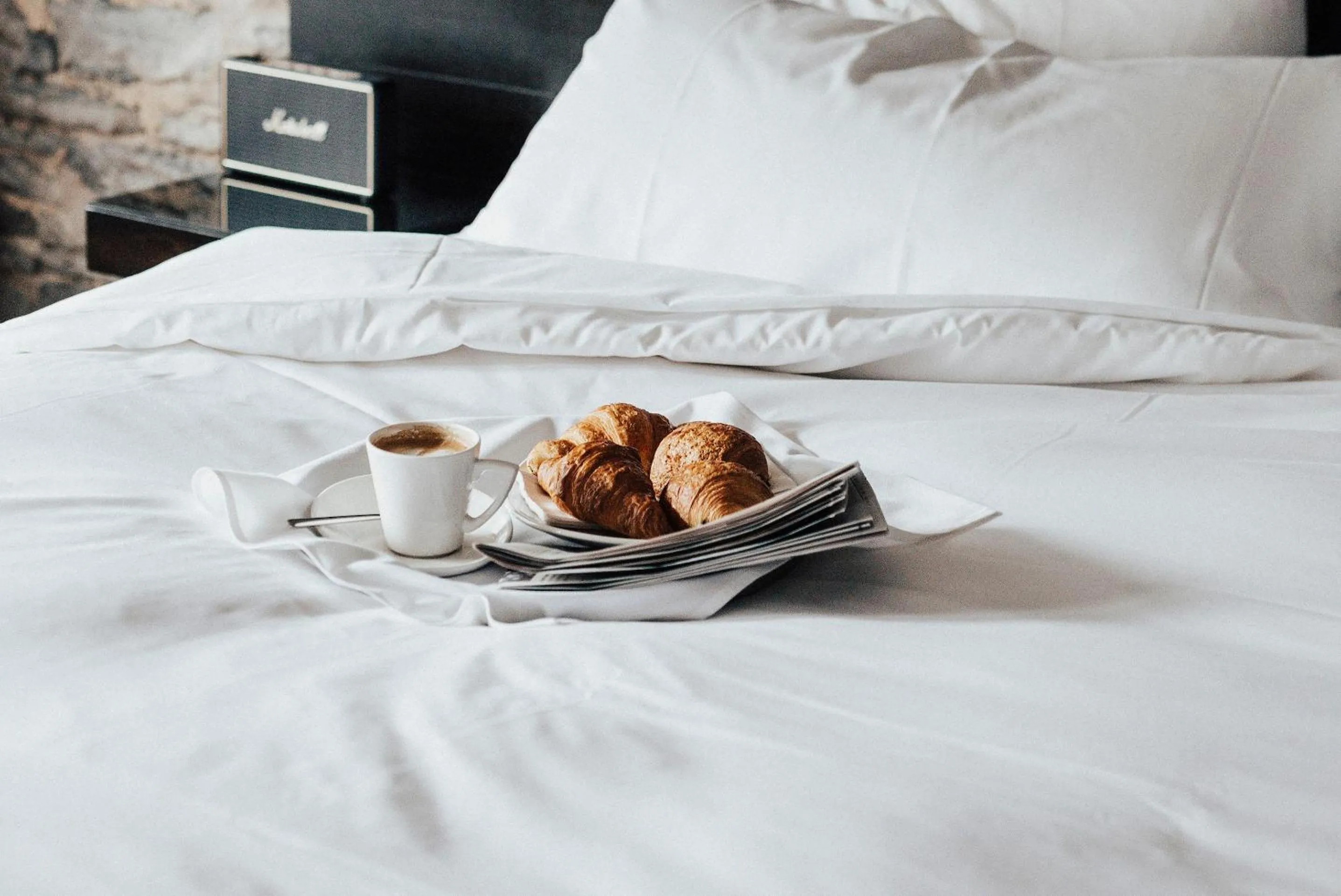 Bed in Le Petit Hotel Notre Dame