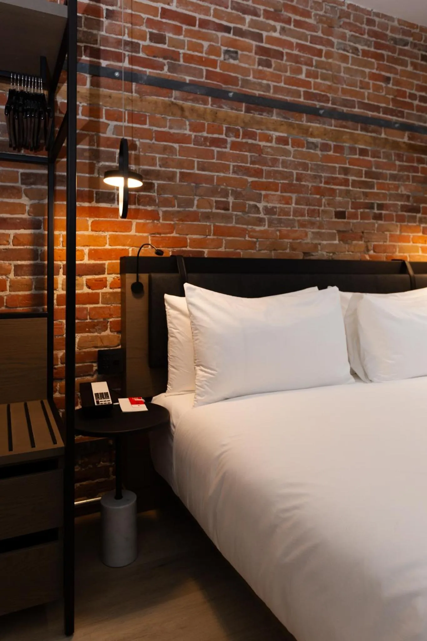 Bed in Le Petit Hotel Notre Dame