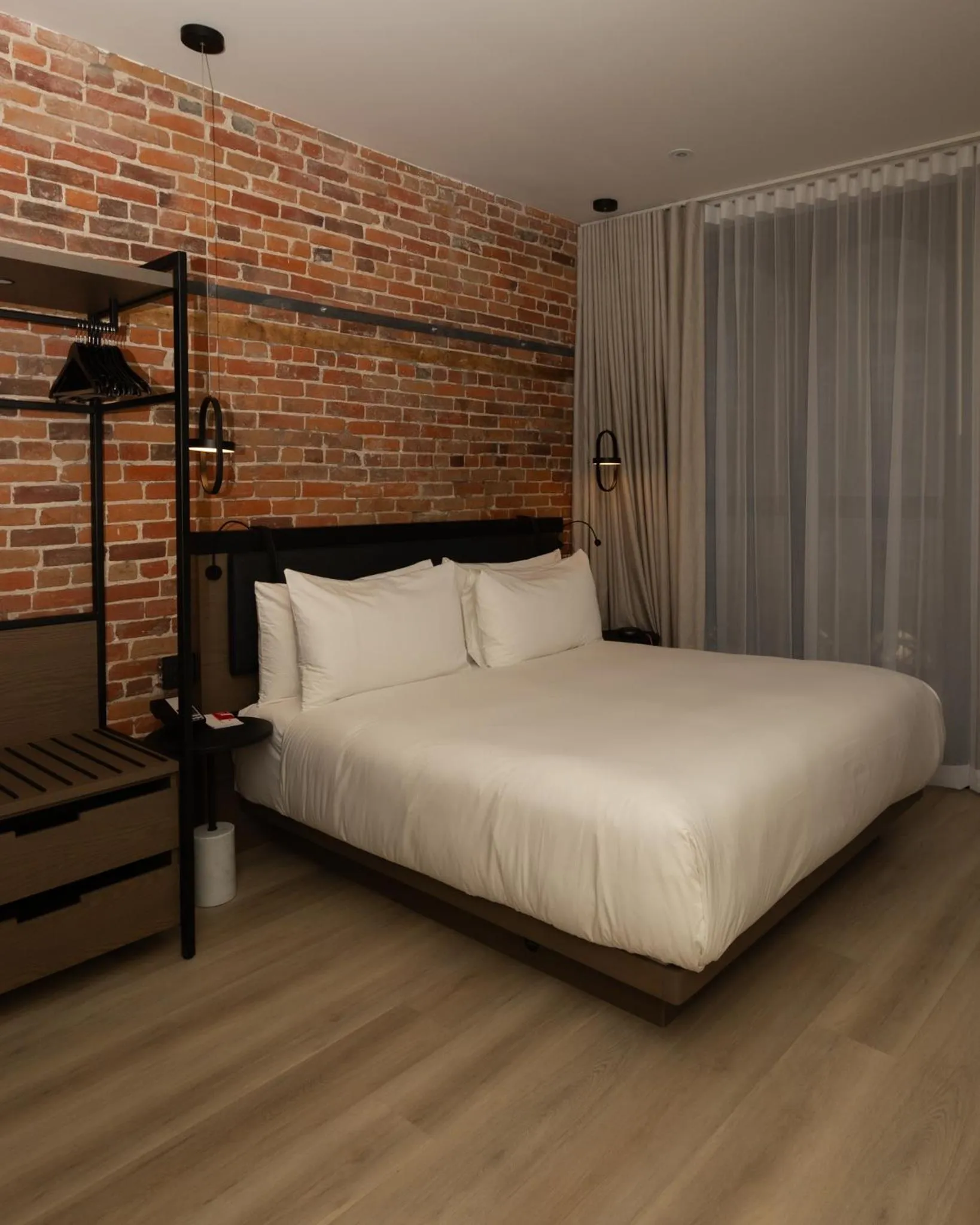Bed in Le Petit Hotel Notre Dame