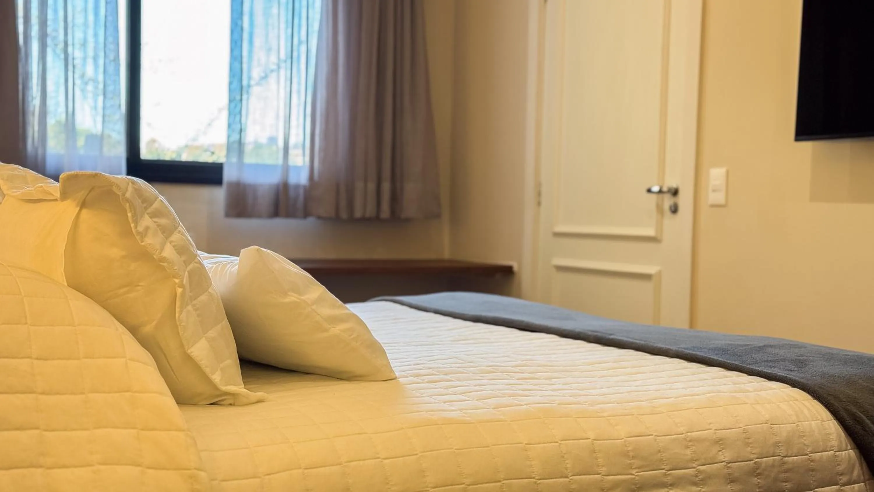 Bed in Pousadinha Campos