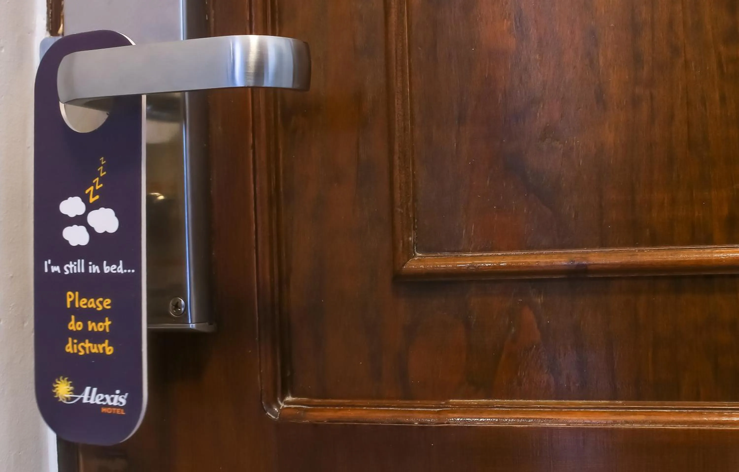 Property logo or sign in Alexis Hotel