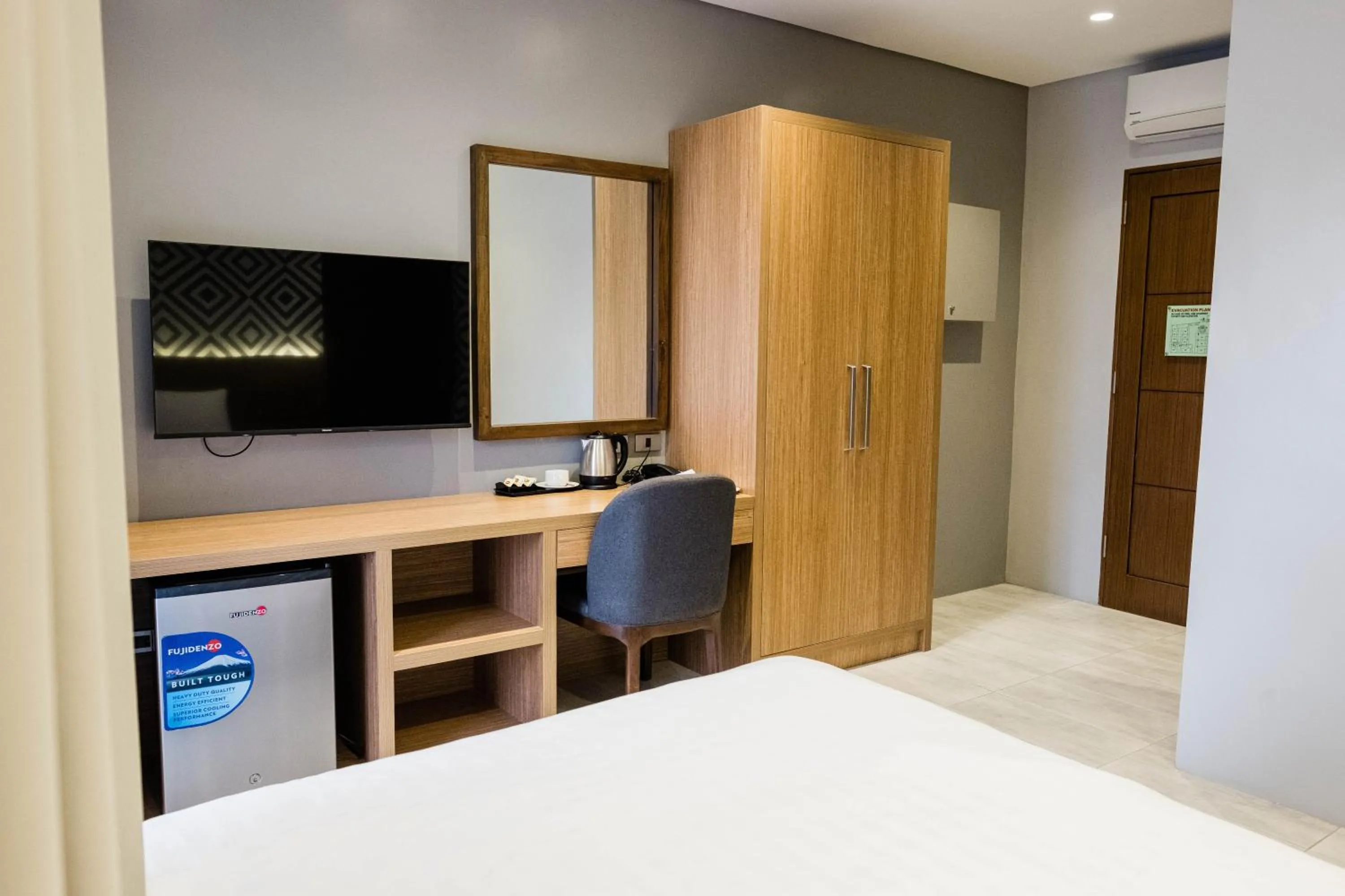 wardrobe, Bed in The Manaoag Hotel