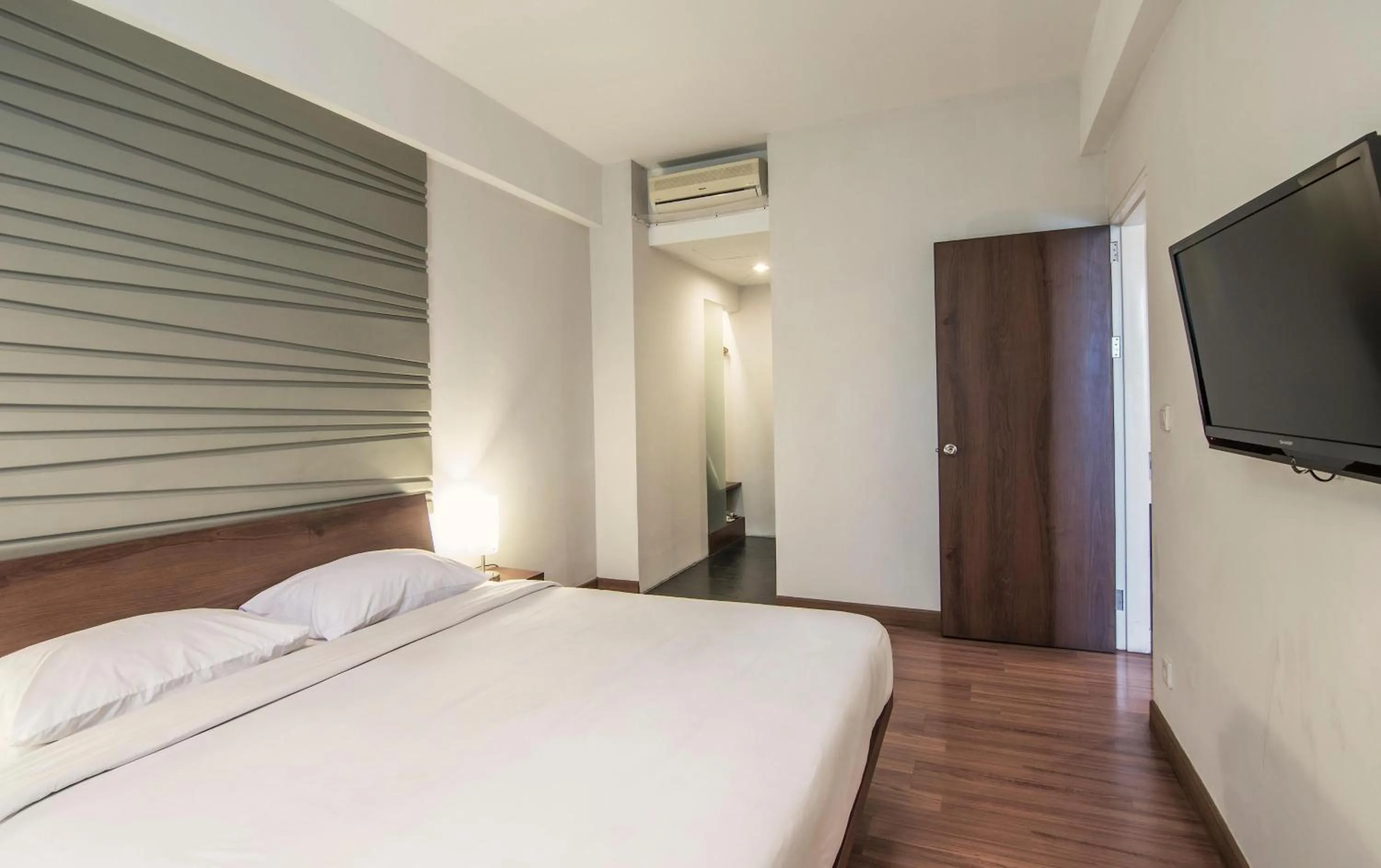 Bedroom, Bed in Grand Cikarang Hotel