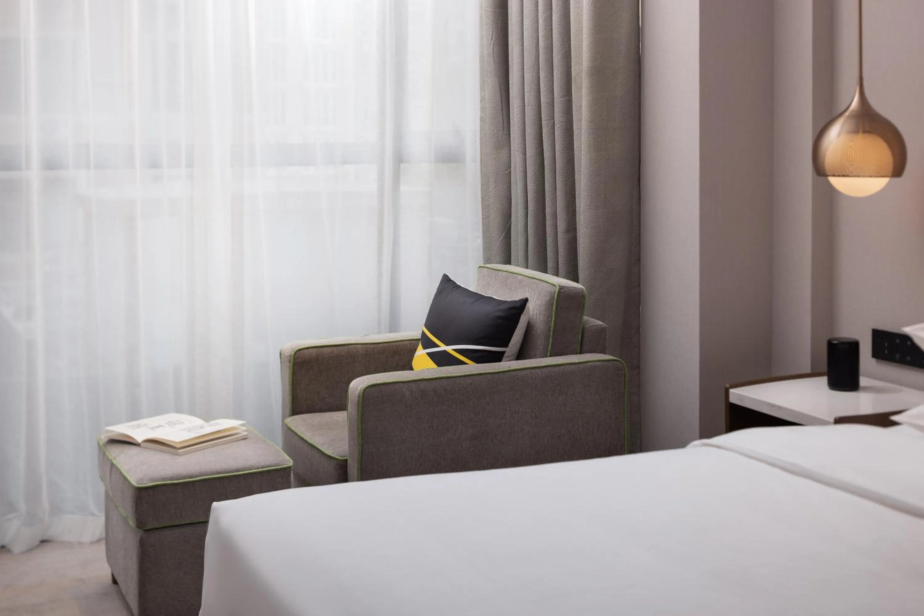 Seating area, Bed in Home2 Suites By Hilton Wuhan Hankou Railway Station