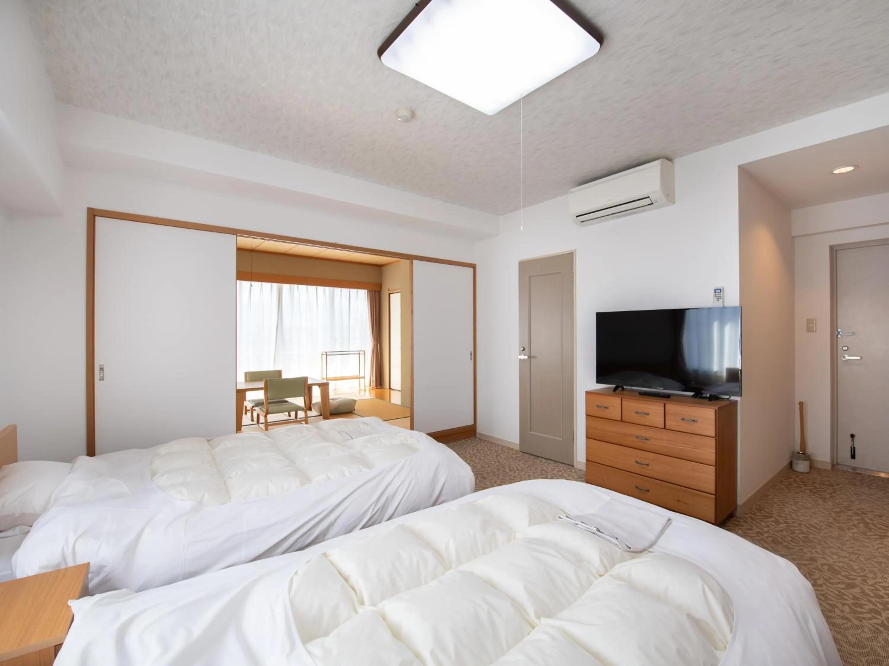 Bed in Chateraise Lodge Kasugai