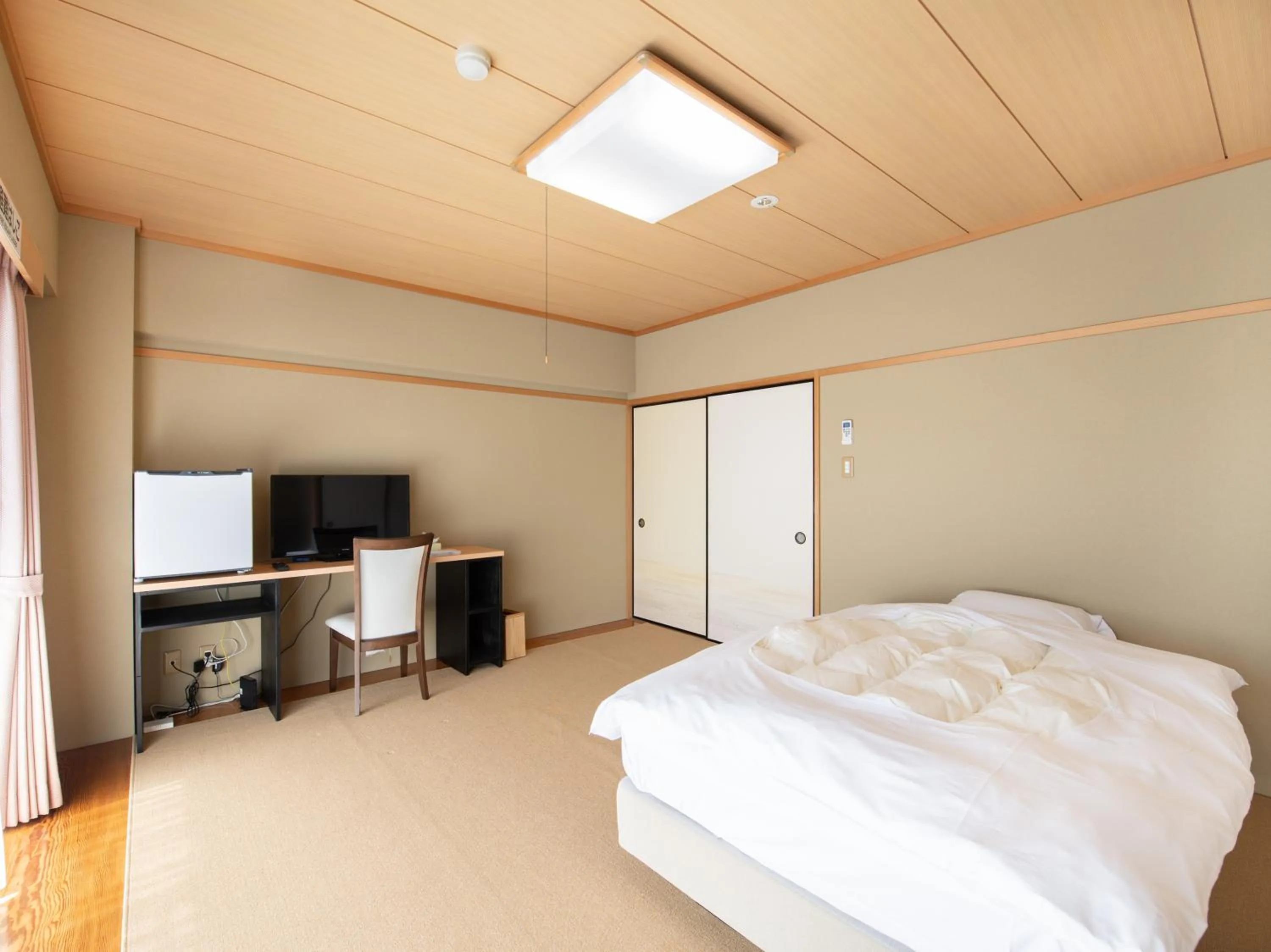 Bed in Chateraise Lodge Kasugai