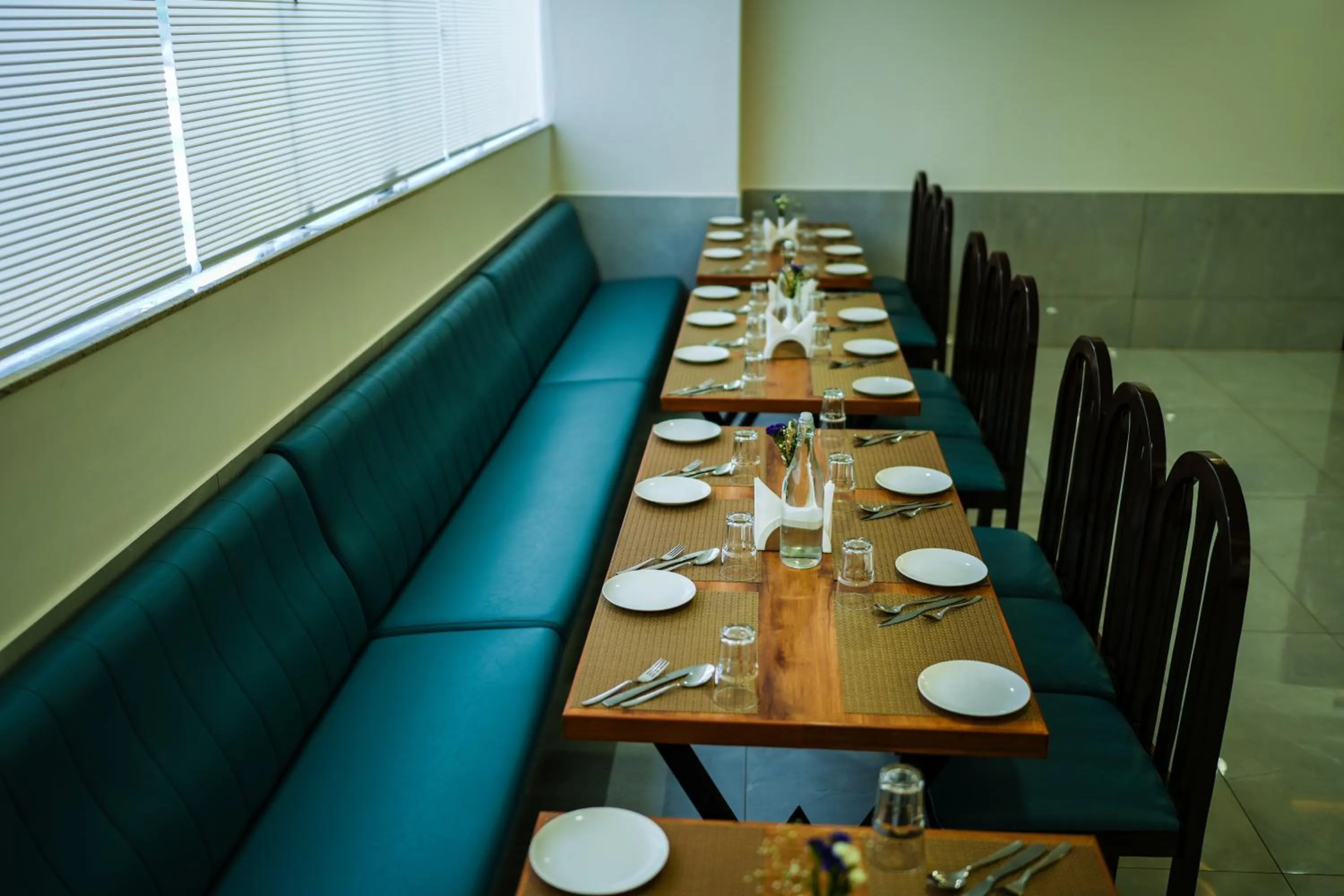 Dining area in Zip By Spree Hotels PurpleOrchid Whitefield