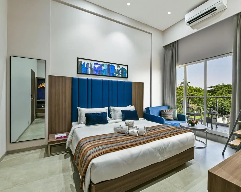 Bed in Meritas Aura Resort