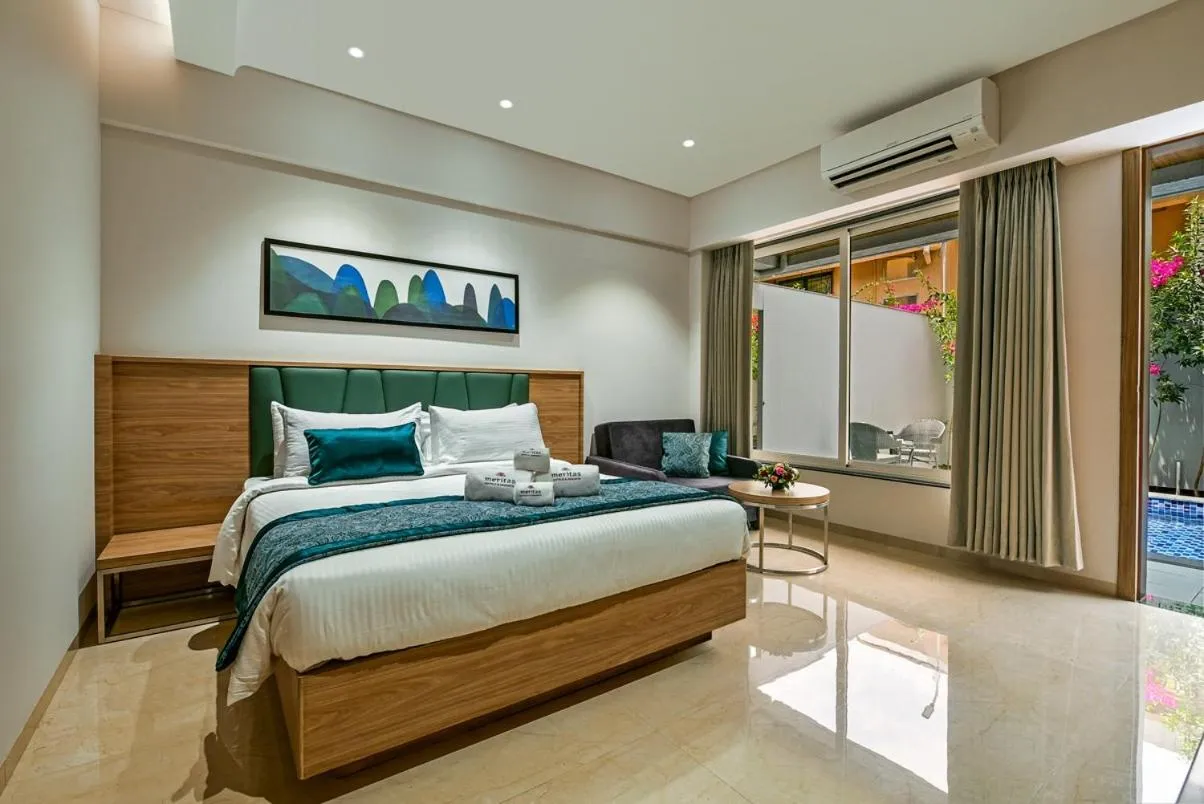 Bed in Meritas Aura Resort