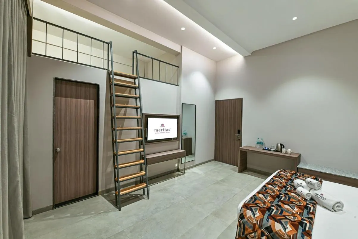 Bed in Meritas Aura Resort