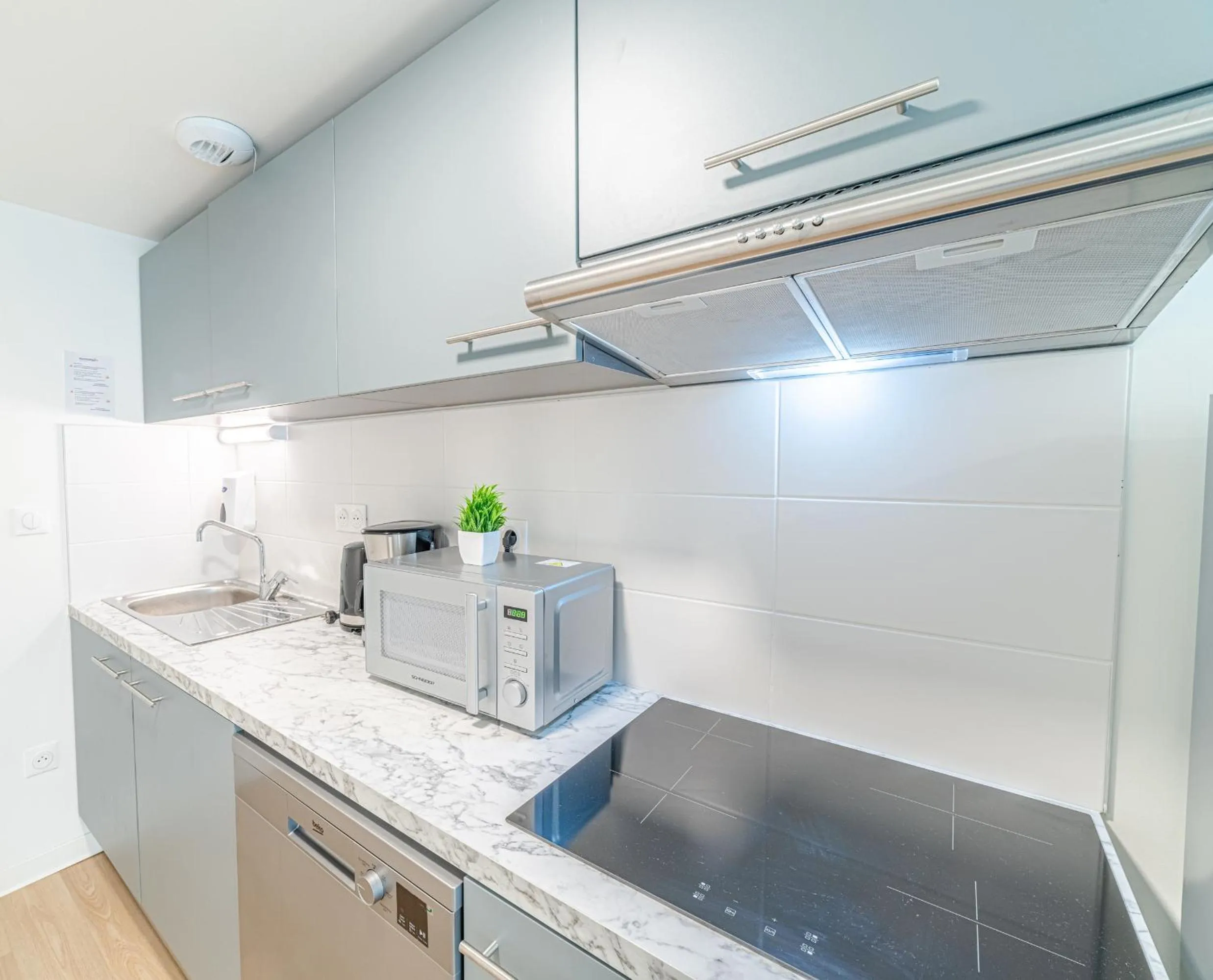 Kitchen or kitchenette in Montempô Appart'Hôtel Toulouse Cité Internationale