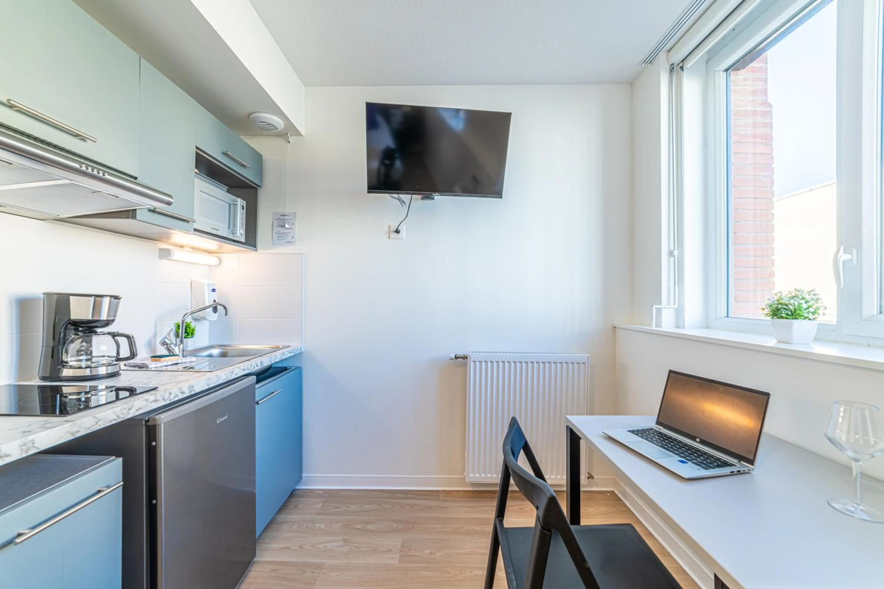 Kitchen or kitchenette in Montempô Appart'Hôtel Toulouse Cité Internationale