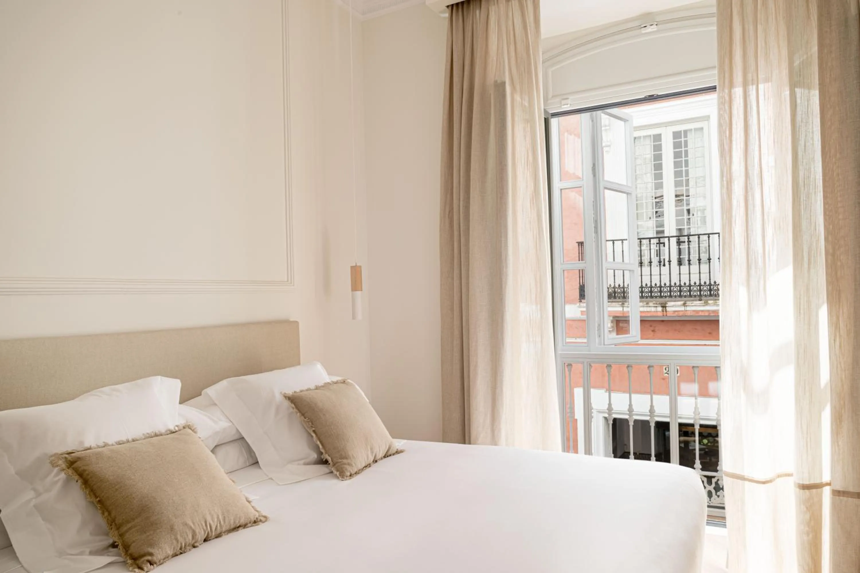 Bed in Mylu Suites by Puerta Catedral