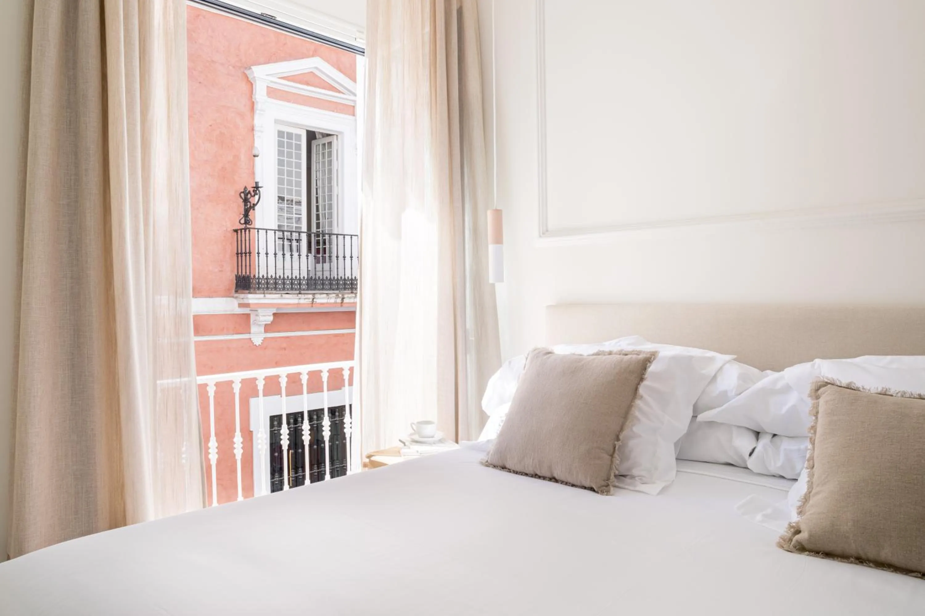 Bed in Mylu Suites by Puerta Catedral